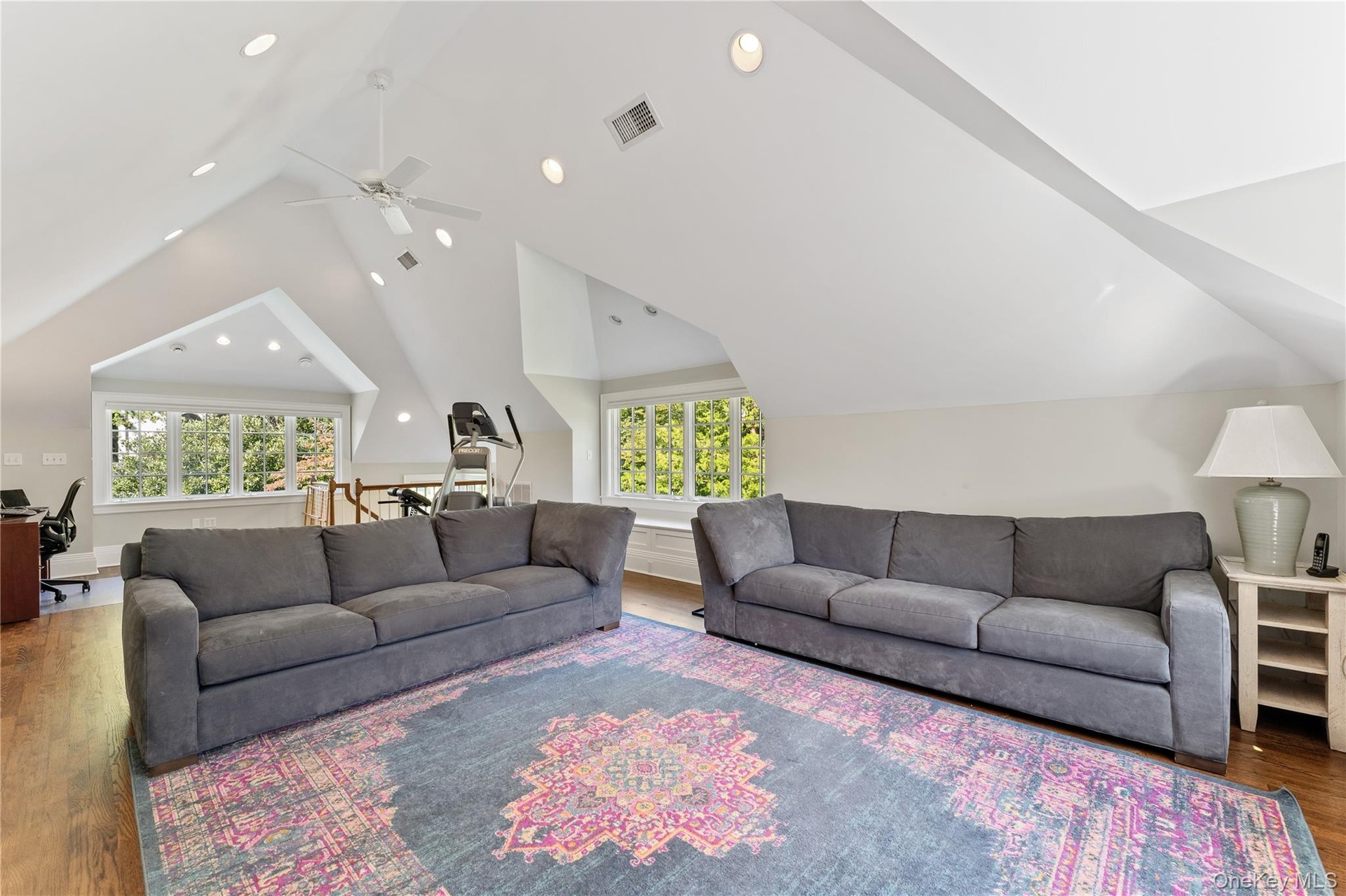 Recreation/office/playroom with soaring cathedral ceiling perfect for guest and family entertainment