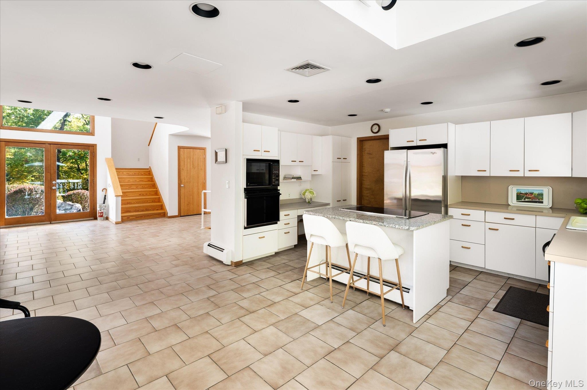 Kitchen open to Foyer