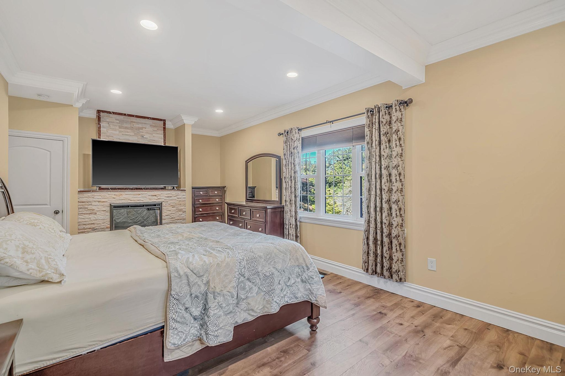 En Suite One (bdrm 3)  with electric fireplace, walk-in closet and bath