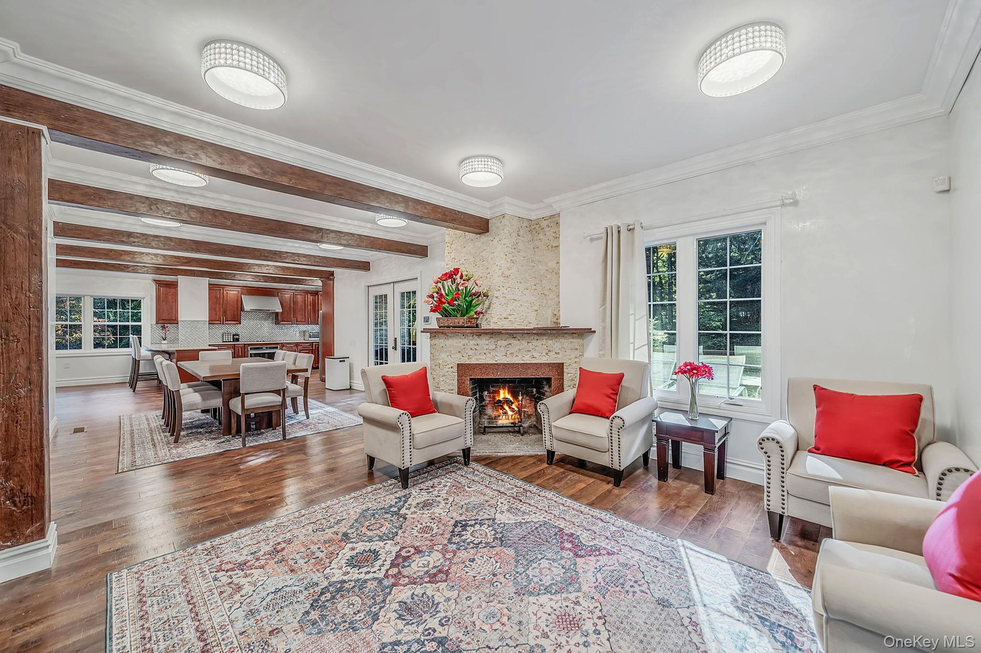 Sitting Room off Den & Dining Room - shares double sided fireplace with DIing Room (not represented)