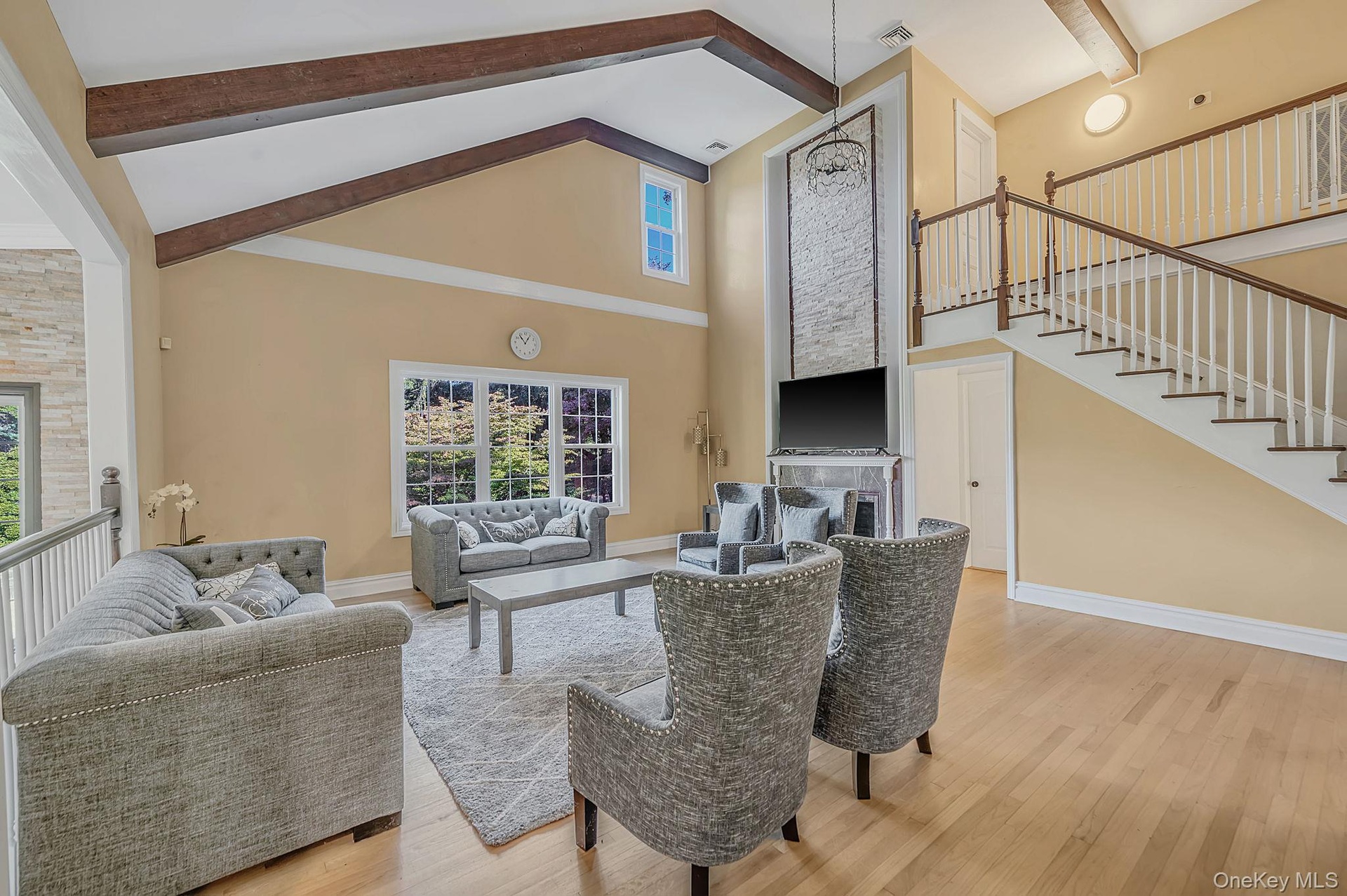 Two story Living Room with entry to first floor en suite