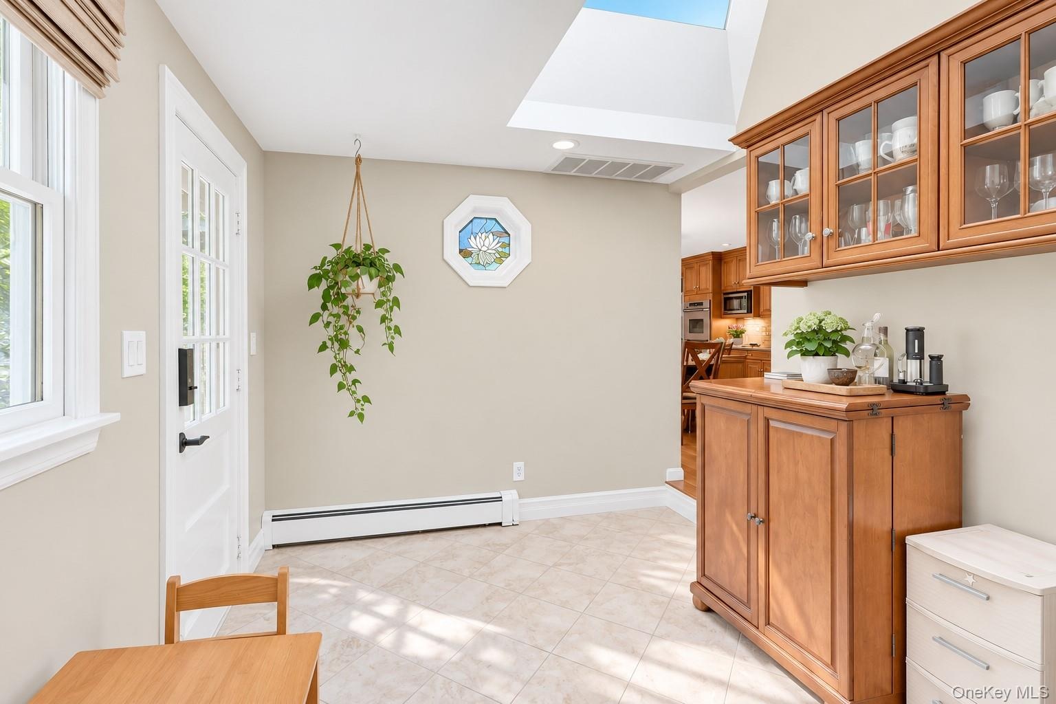 Mud Room/Bar Area or Potential Laundry Room Adjacent to Kitchen & Den