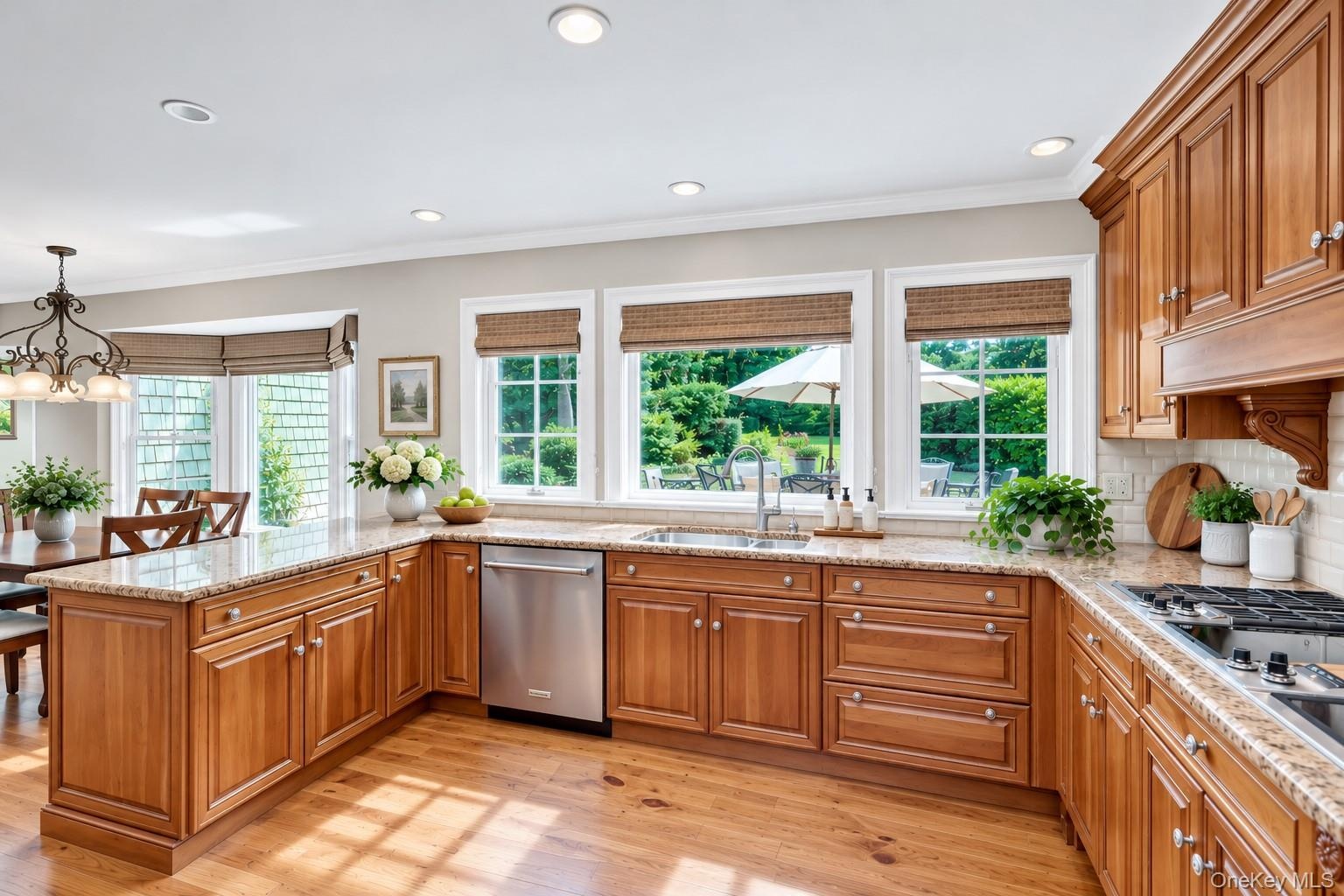 Custom Kitchen With Large Windows Overlooking Yard