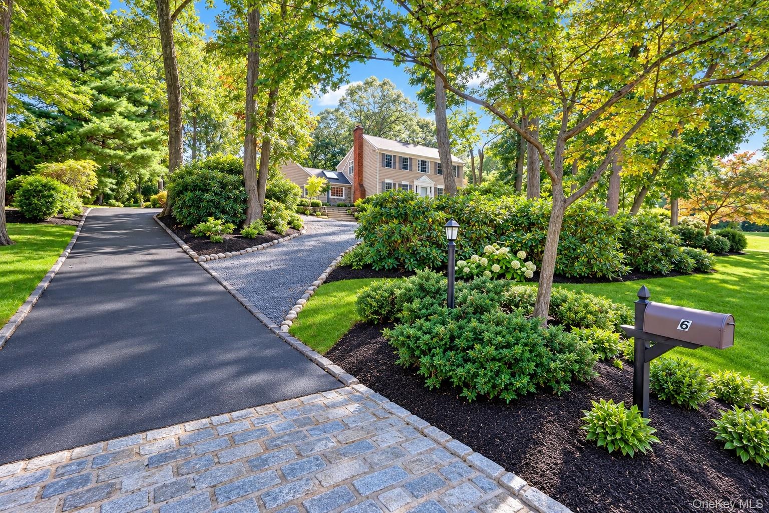 2 Driveways! One Leading to the 2 Car Garage With No Steps, and Circular Driveway With Steps and Walkway to Front Door