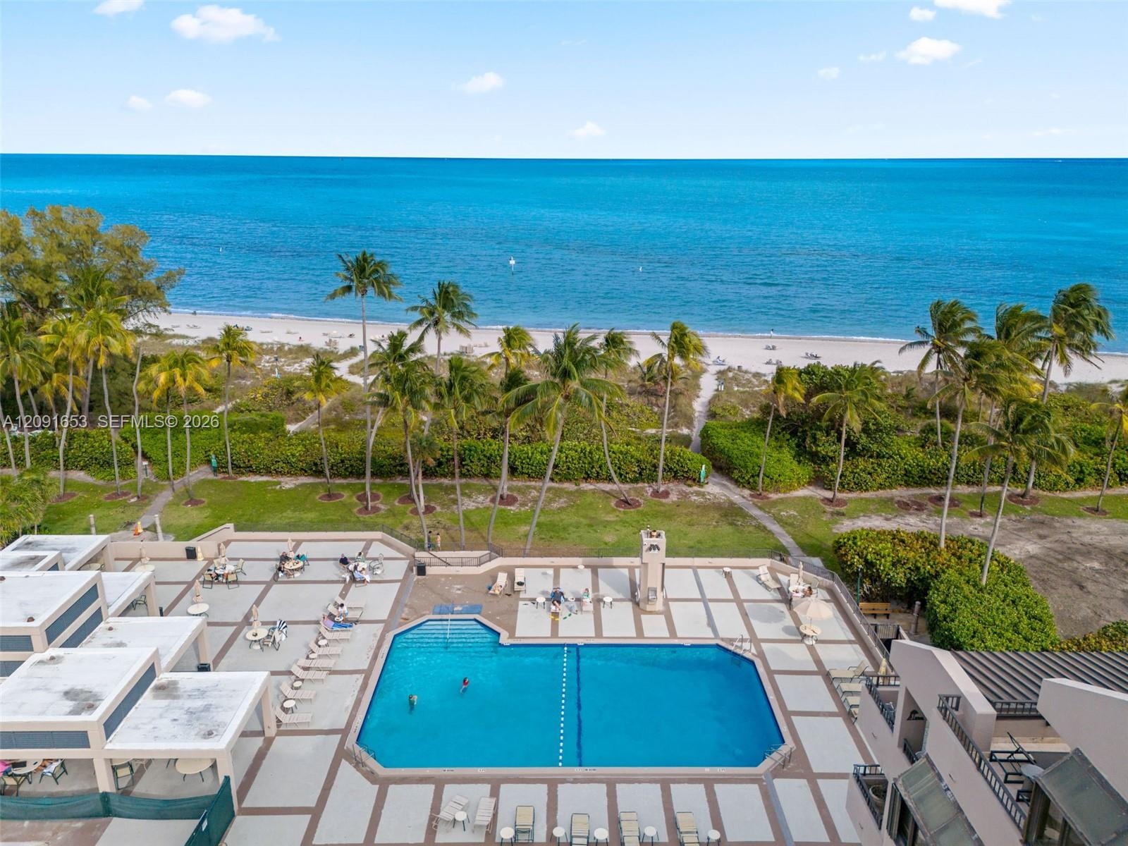 Oceanside pool with restaurant and beach access