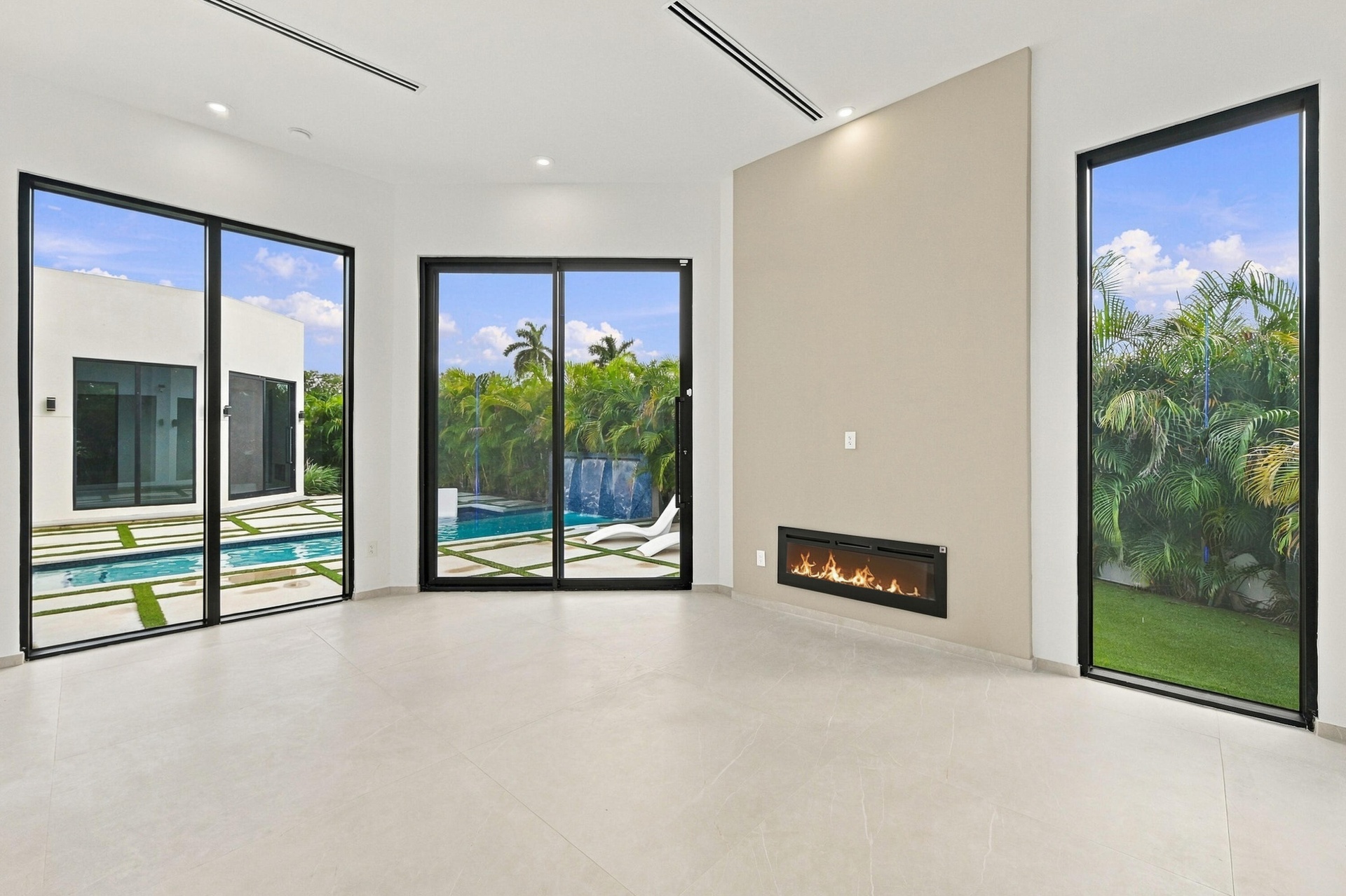 Primary bedroom with access to your heated salt, water, pool, and beautiful back yard.