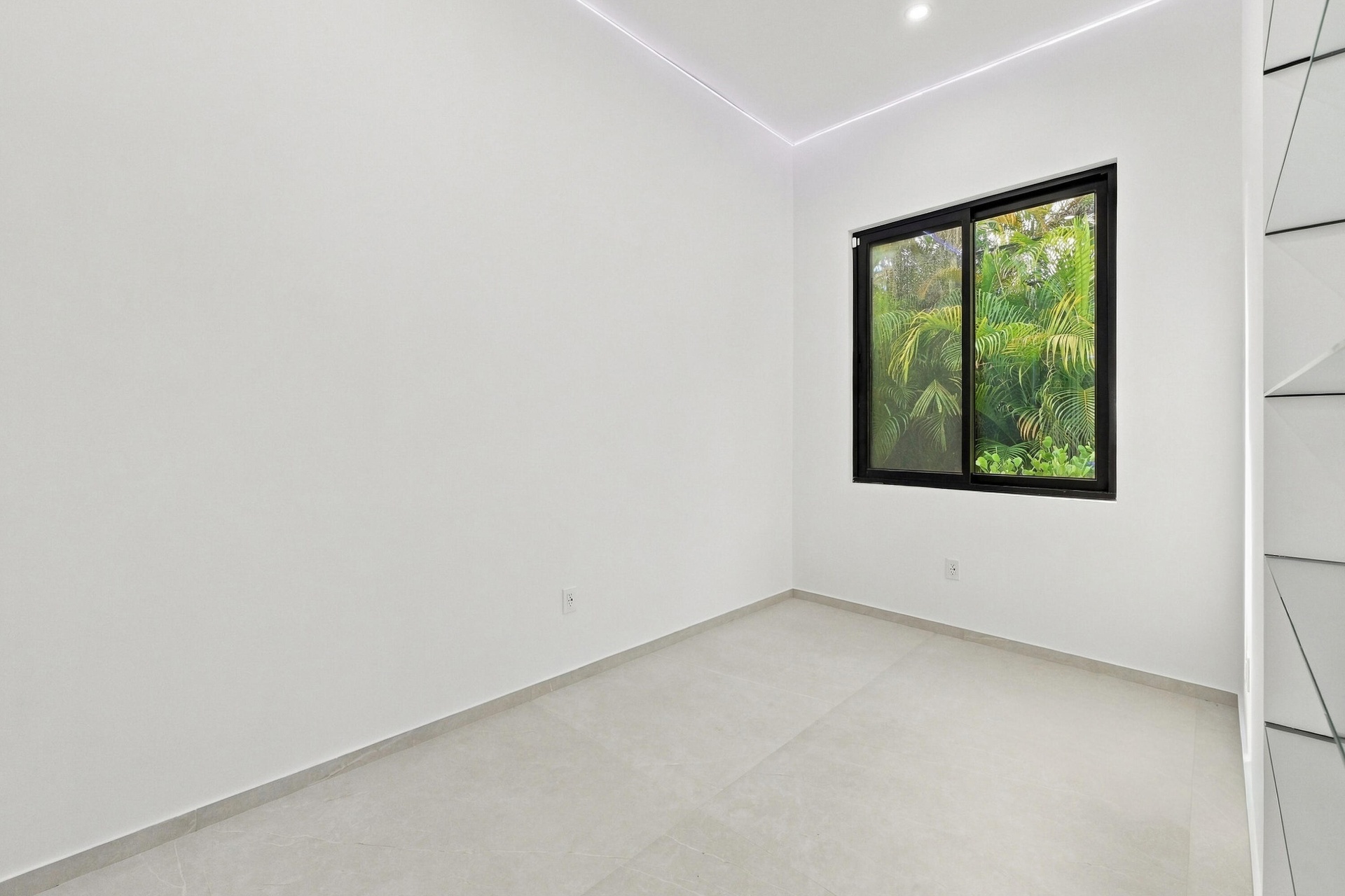 Office with glass wall looking at your beautiful living room .