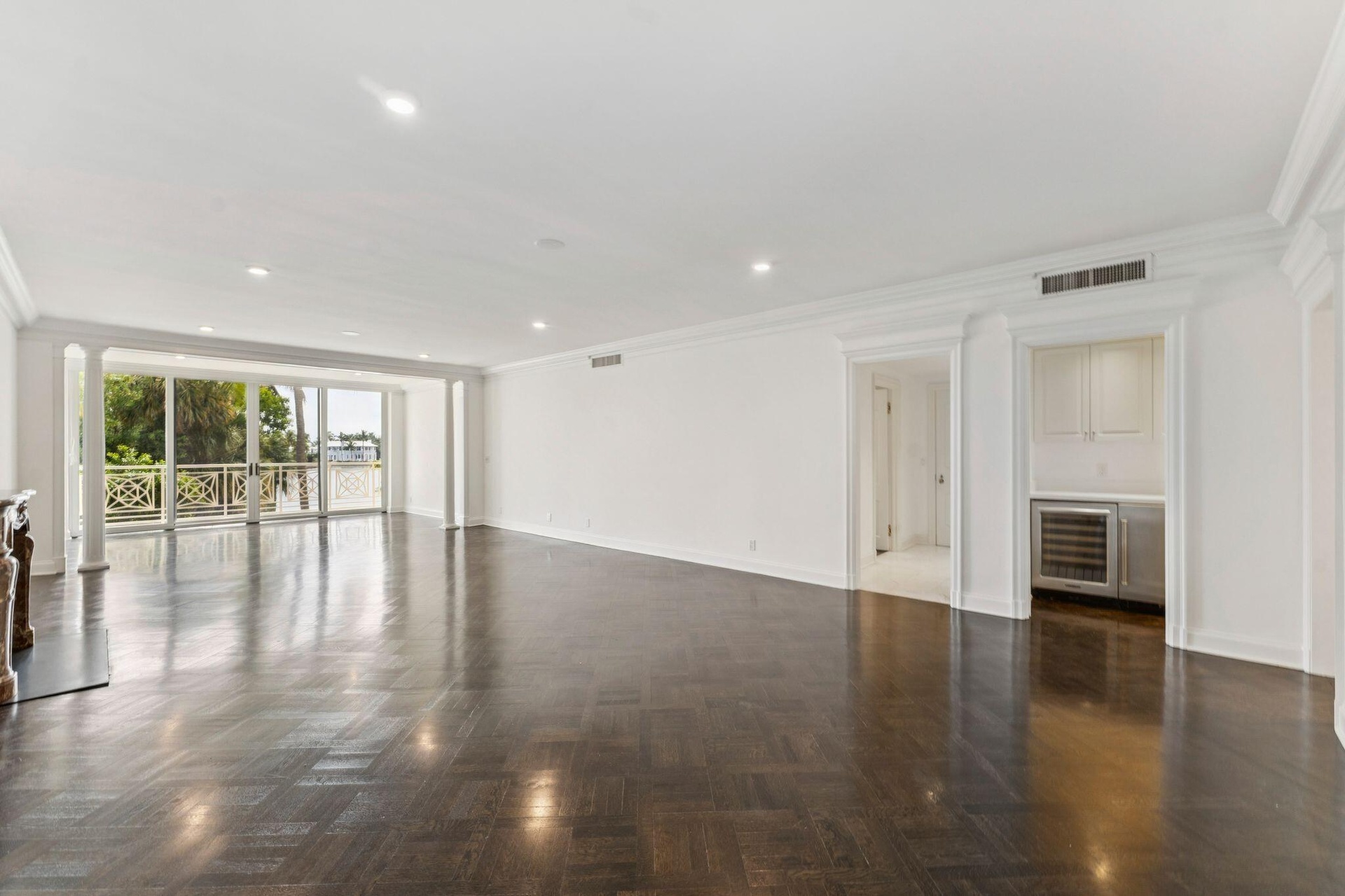 living room, wet bar at right