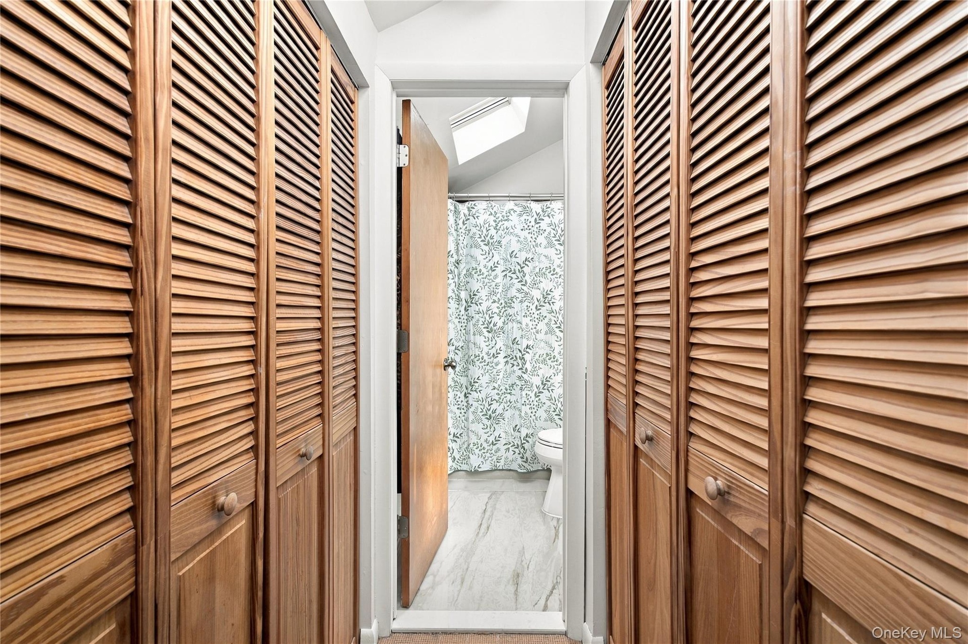 2nd Bedroom Closet/Bathroom suite with dual closets and modern bathroom