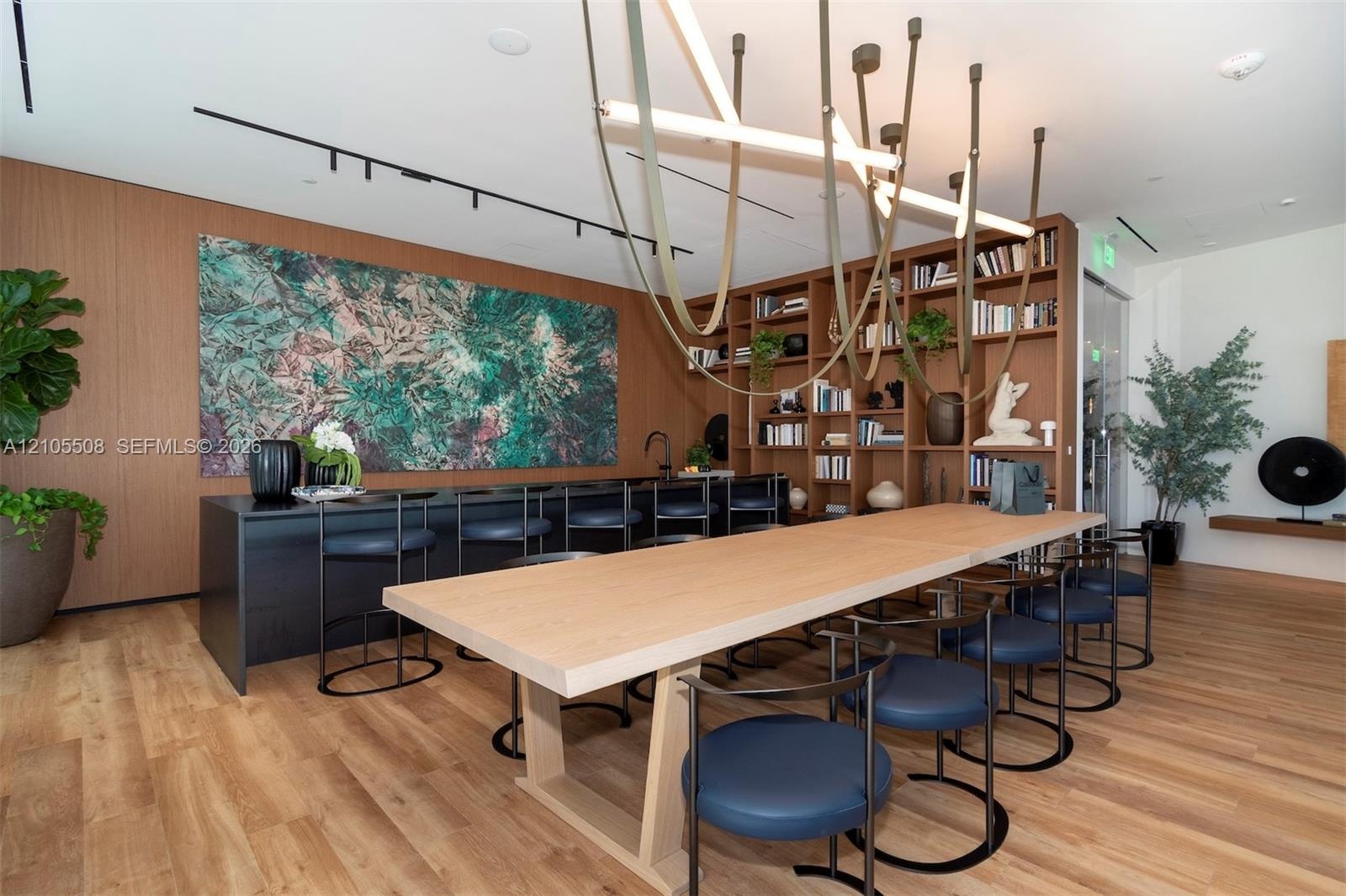 Wood-finish flooring with a multi-person dining table