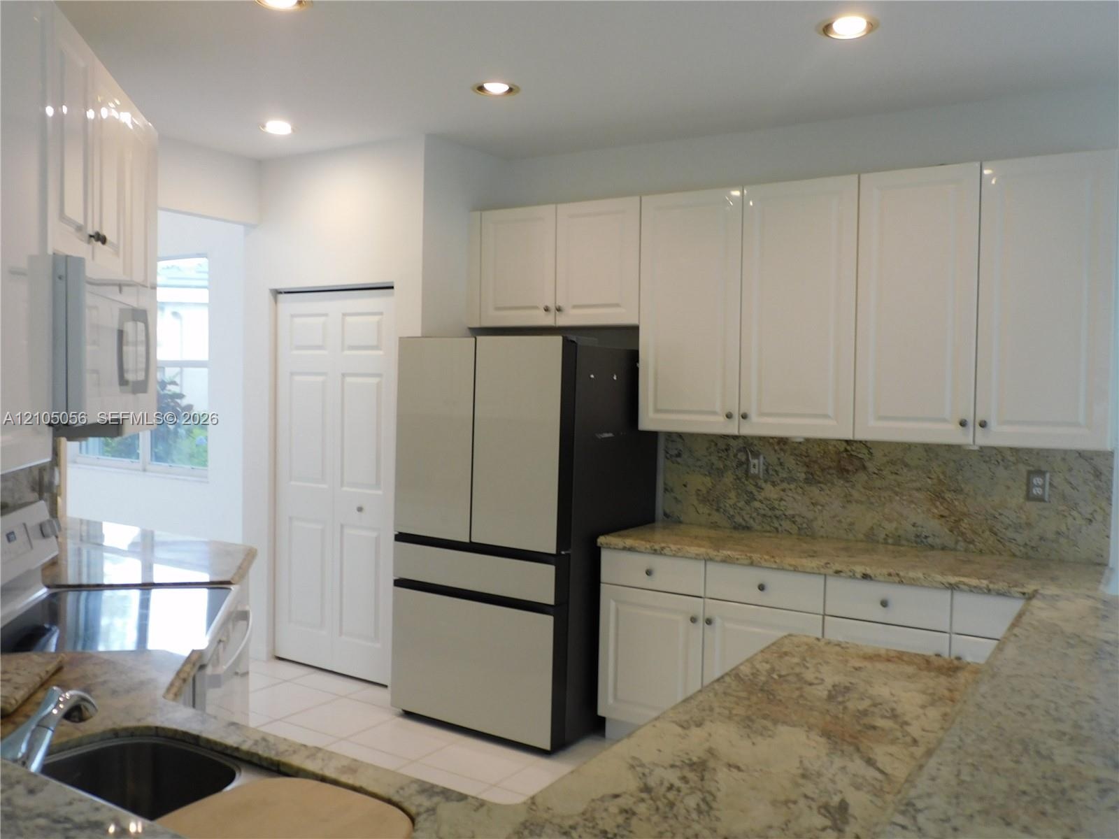 Breakfast nook right off the kitchen with views to the lake.