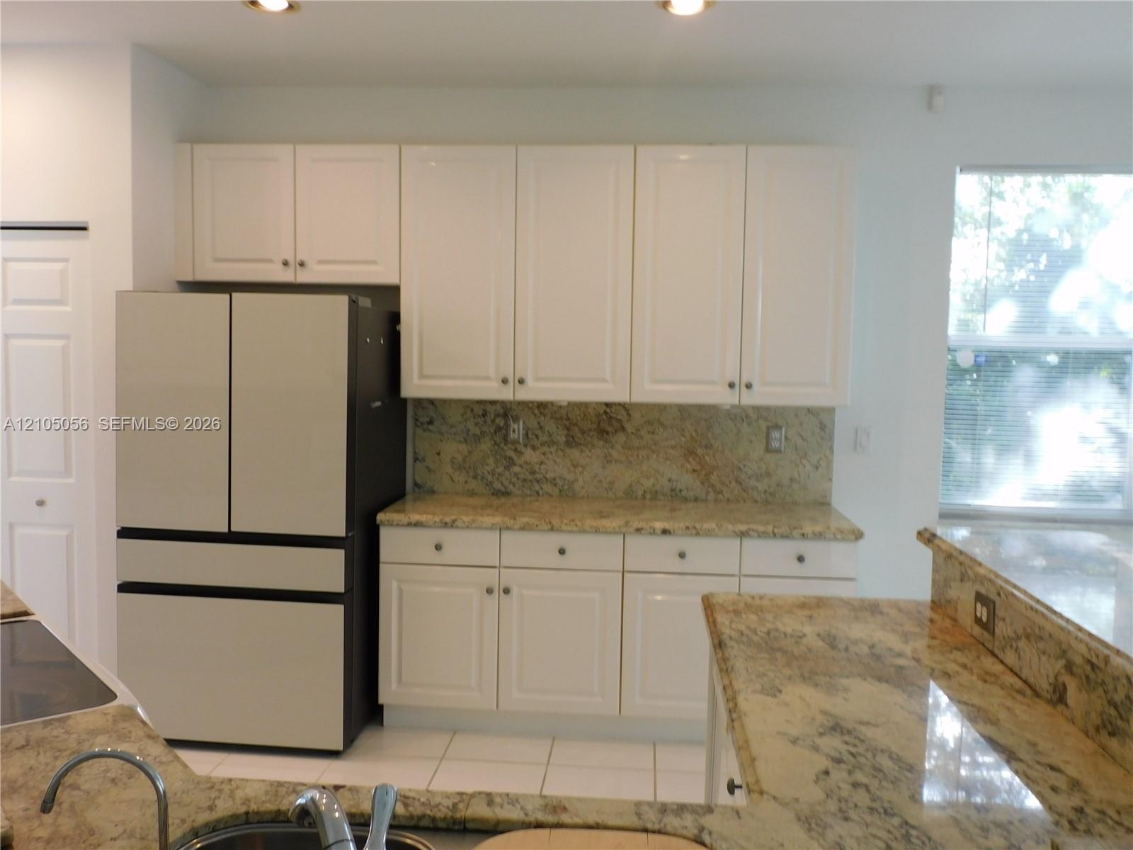 Kitchen nicely opens to Family Room and Breakfast nook.
