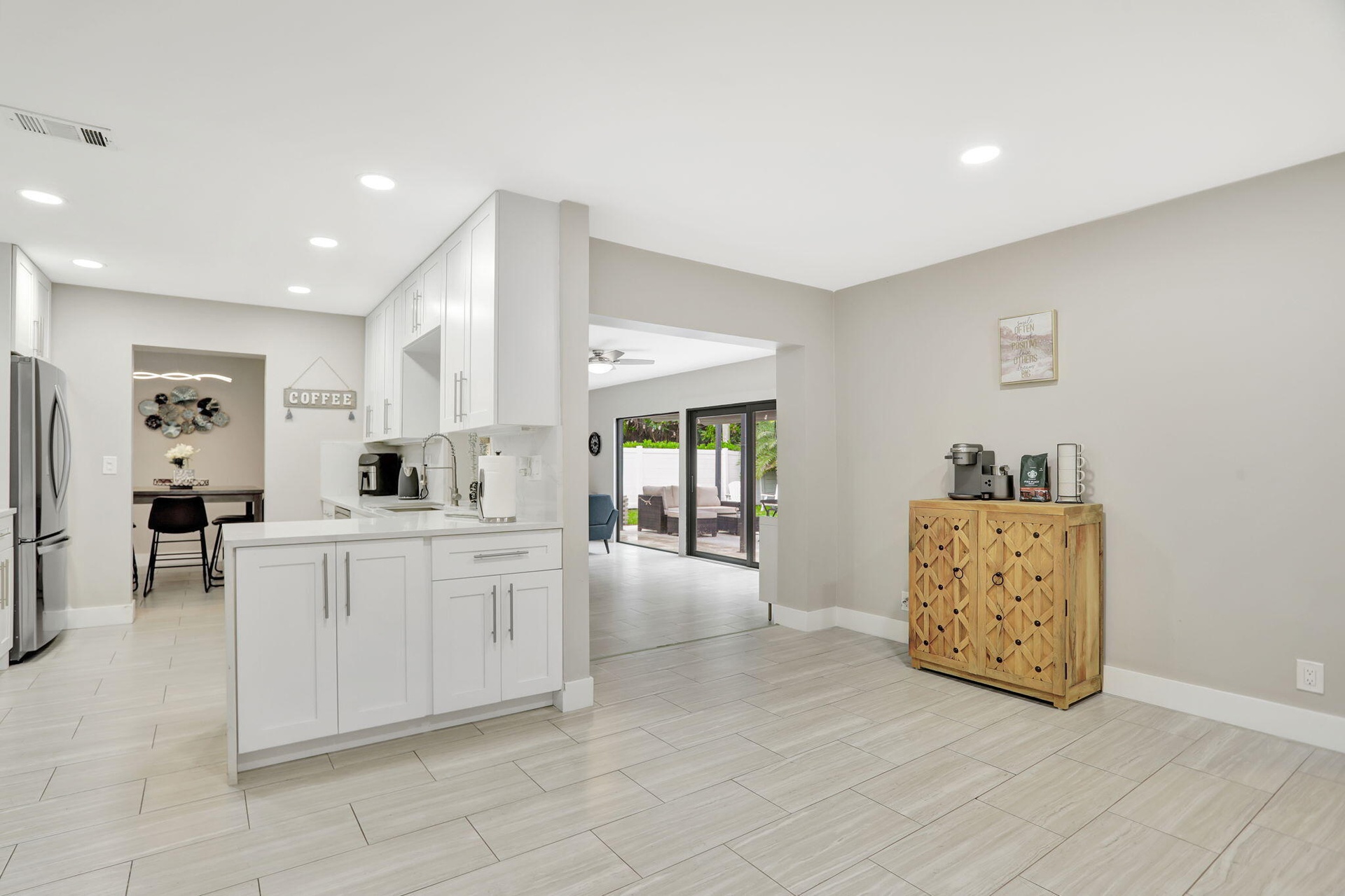 Versatile flex space off the kitchen—ideal for a home office, reading area or additional gathering space
