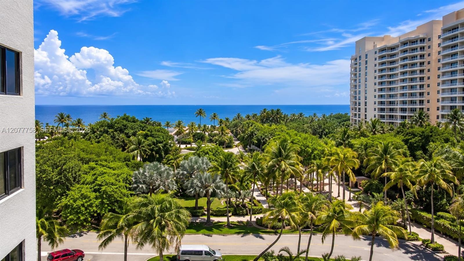 Expansive oceanfront scenery with abundant tropical foliage