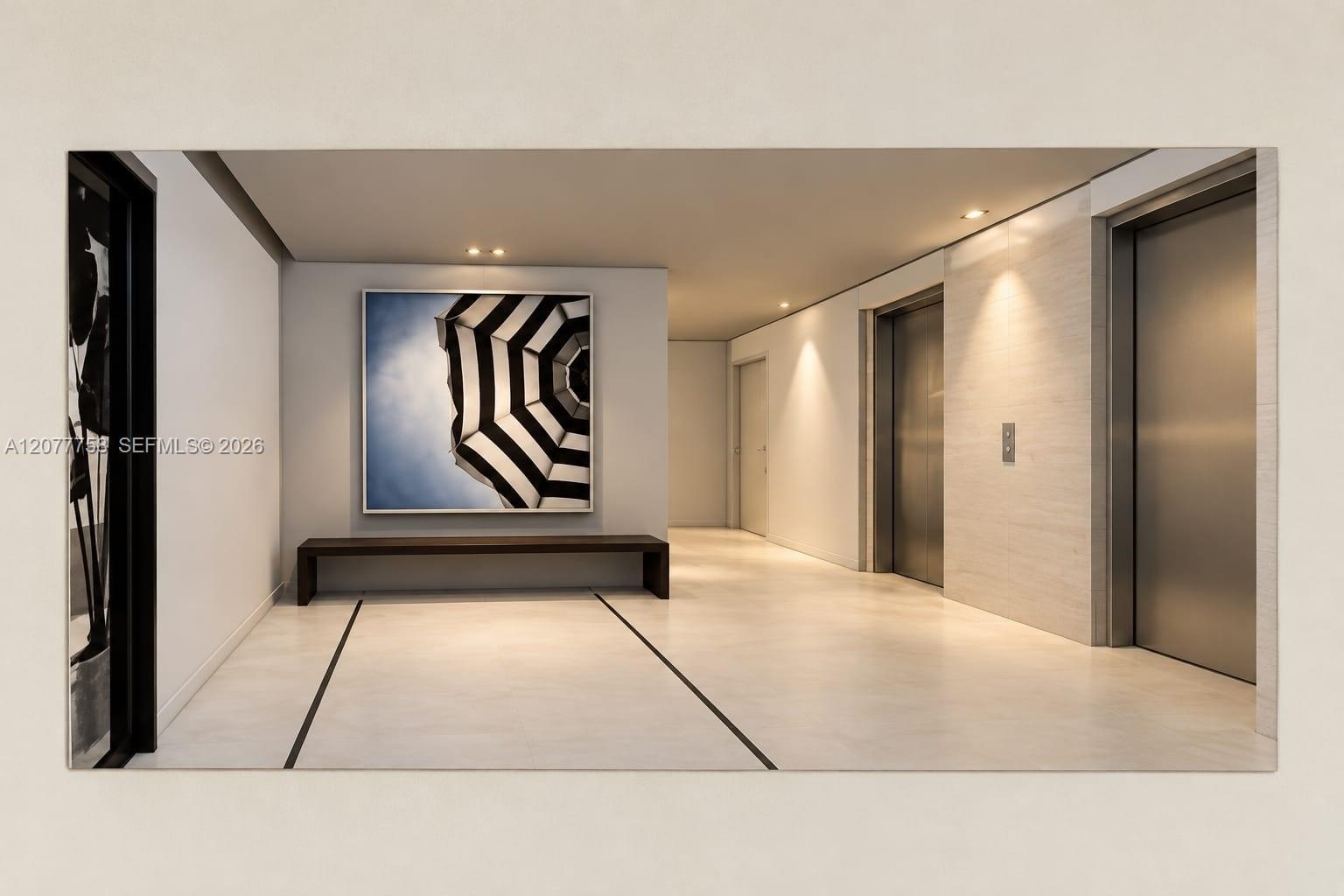 Recessed ceiling lighting, light-toned flooring with dark inlay, and multiple elevator access points