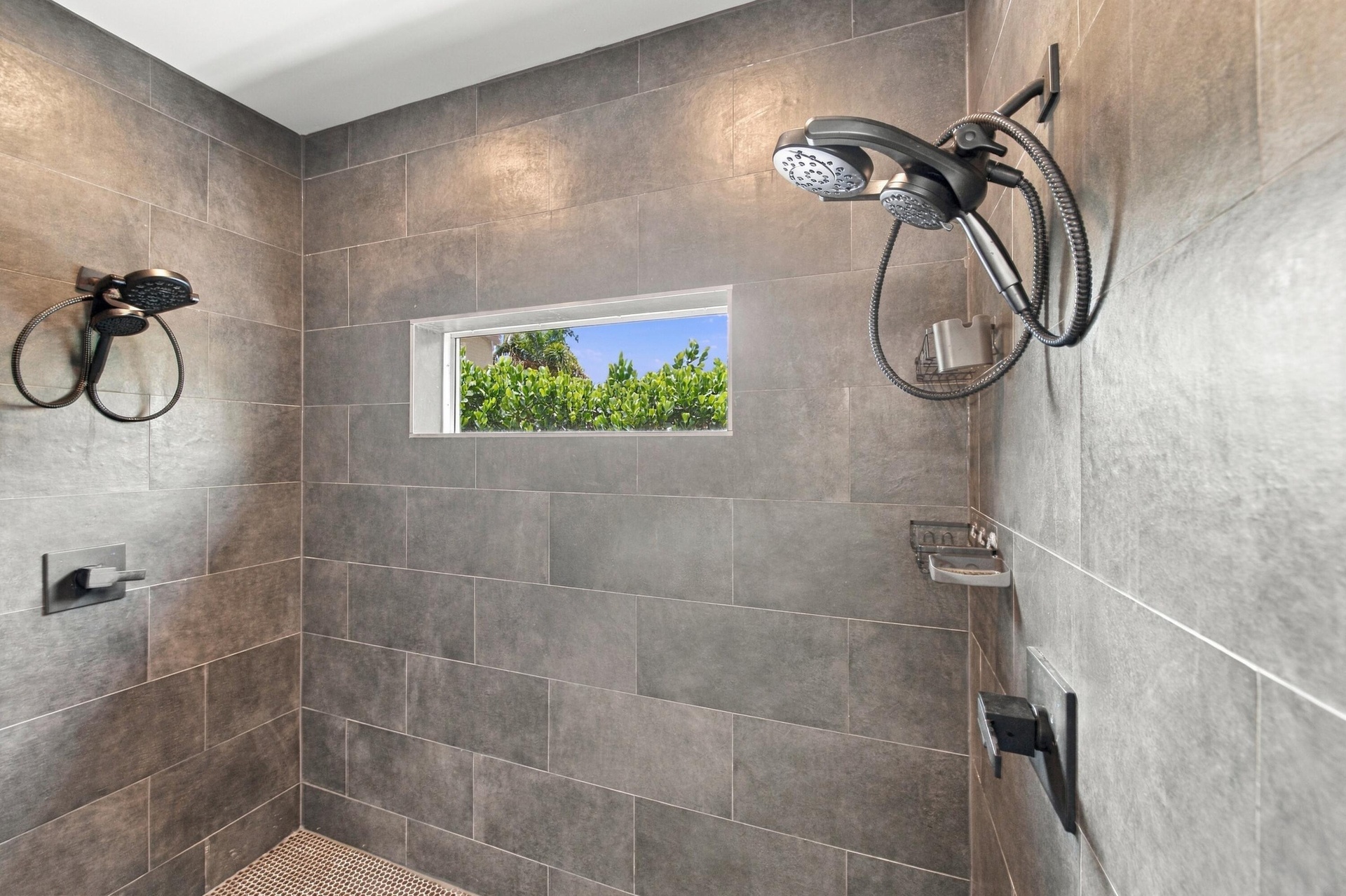 This is designed for 2 NFL Football players to shower at the same time.