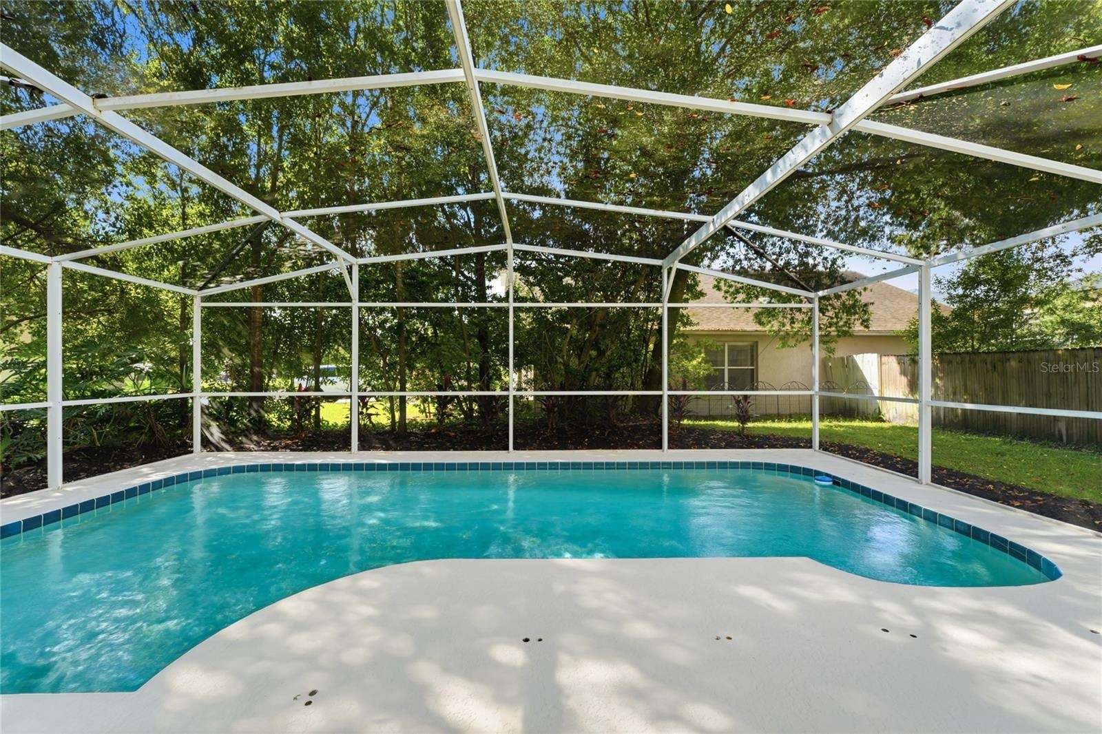 Pool includes a removable child safety net that is currently stored in the garage