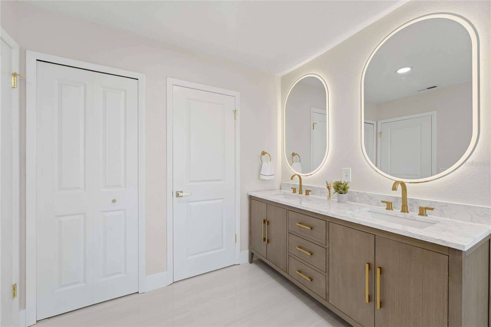 Upgraded frameless LED-lit mirrors