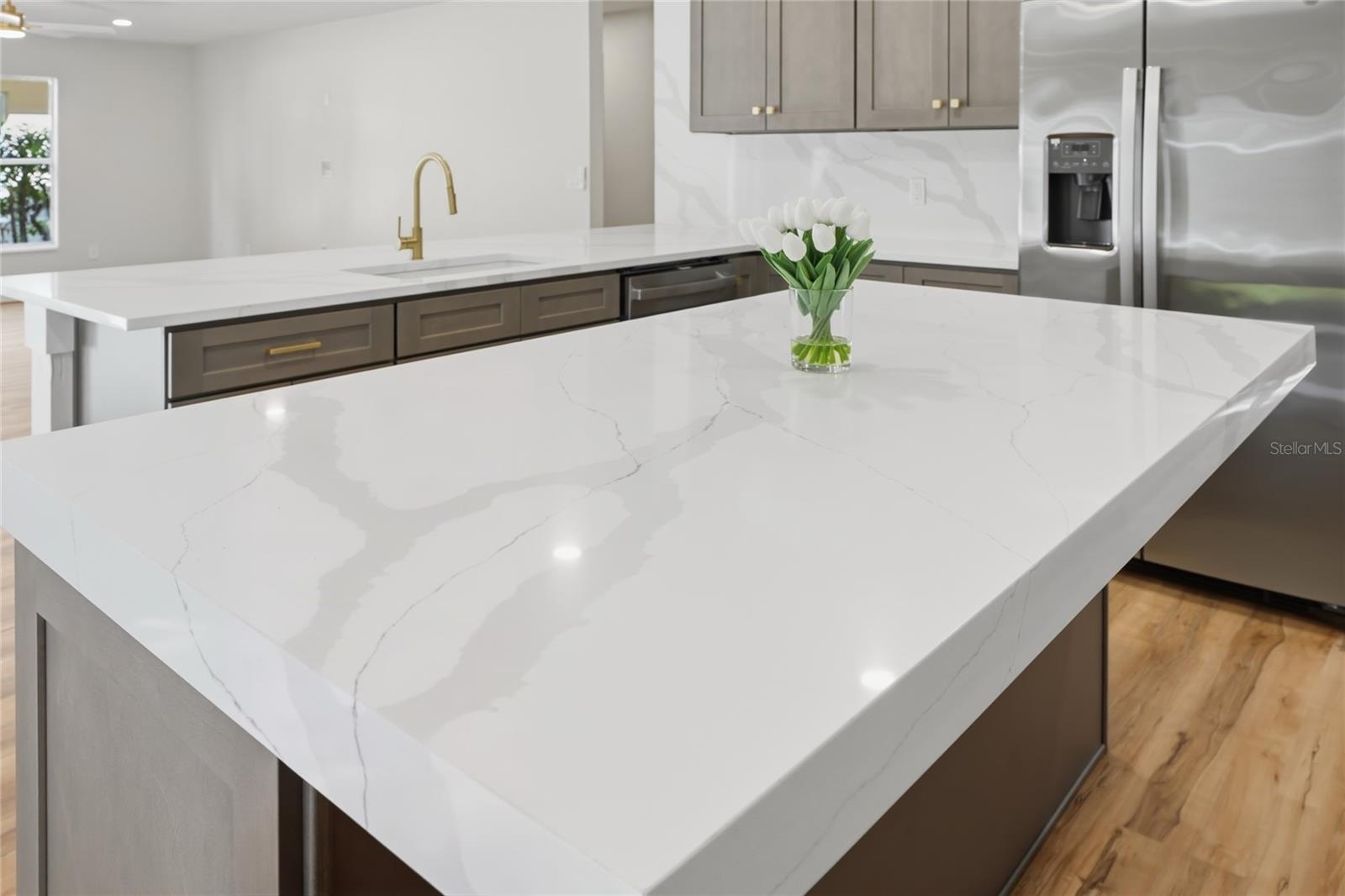 Quartz mitered-edge custom detailing featured on this beautiful island