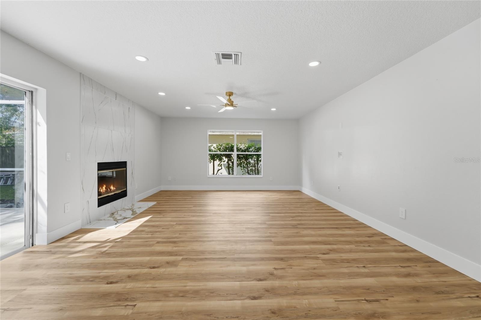 Great room featuring abundant natural light and recessed lighting
