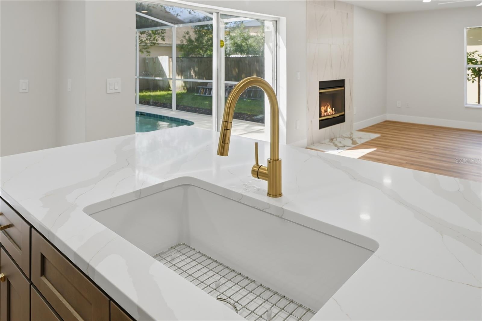 Seamlessly opening into the living area for an ideal layout for entertaining and daily living