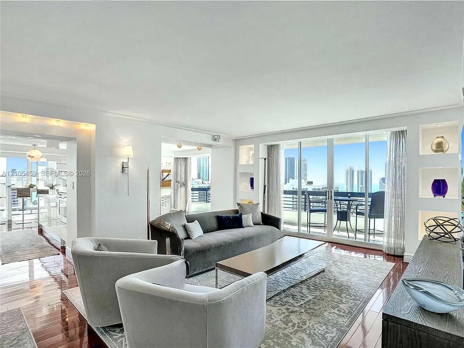 Expansive living area with wood-finish flooring