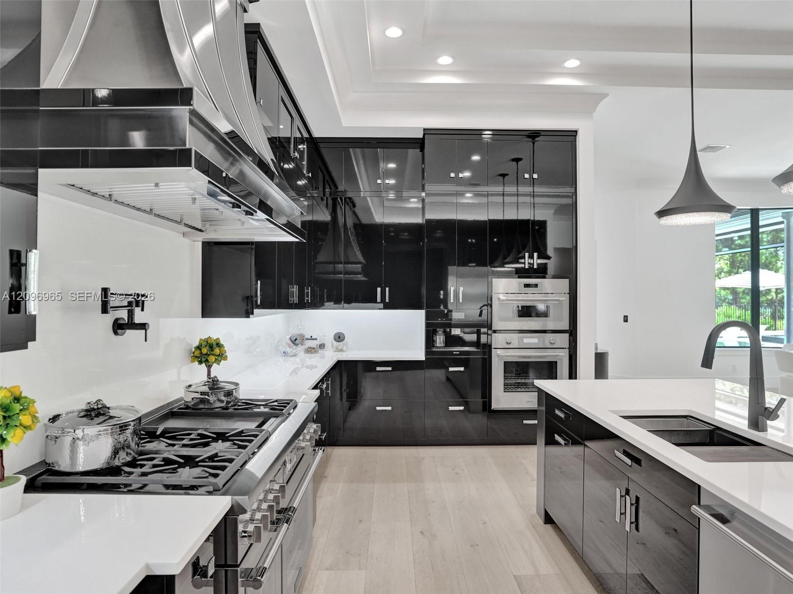 Textured floor-to-ceiling fireplace surround, horizontal linear fireplace, and integrated dark-toned display shelving with recessed lighting