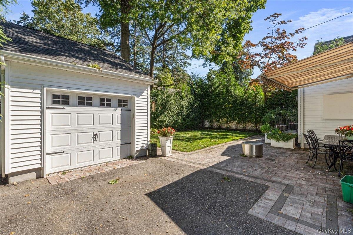 Detached Garage, Patio with Awning and Outdoor Television