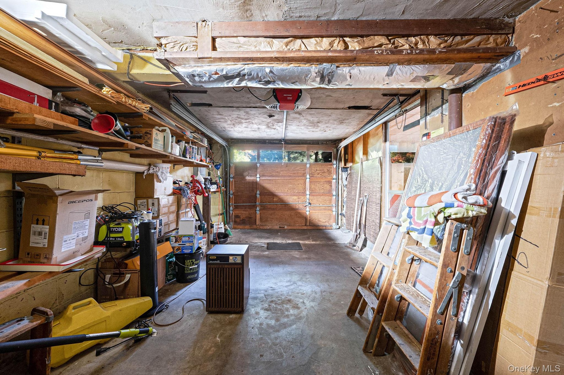 garage with entrance to the basement