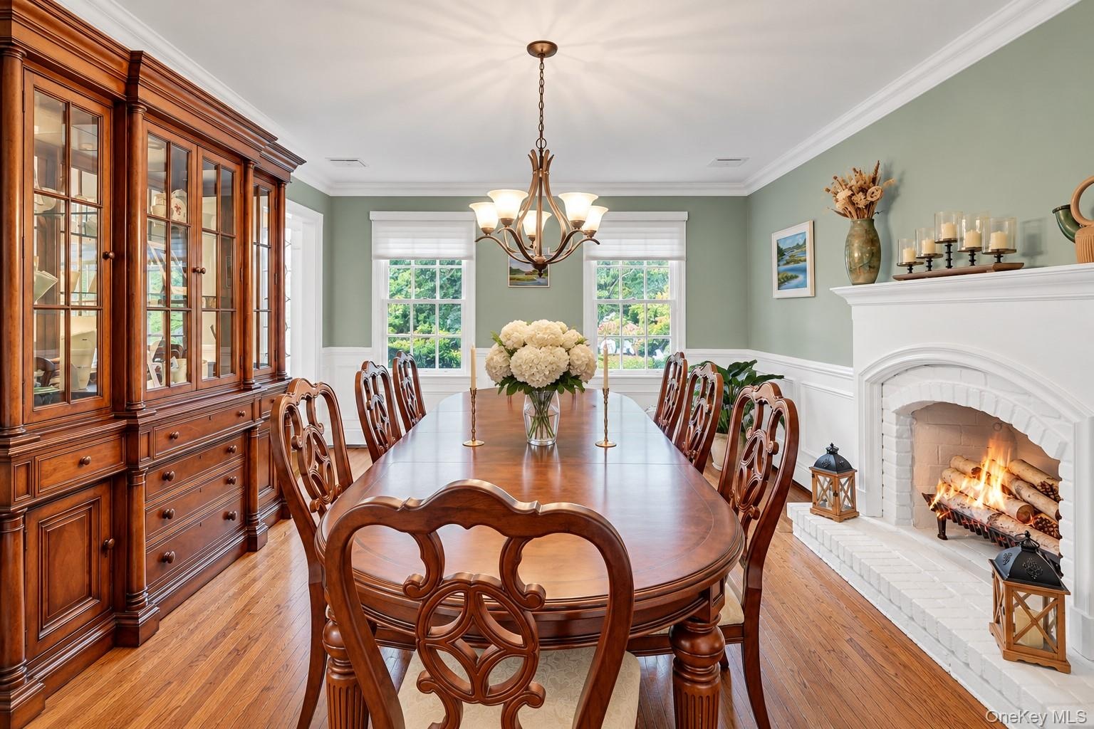 Formal Dining Room With Fireplace & Wainscoting