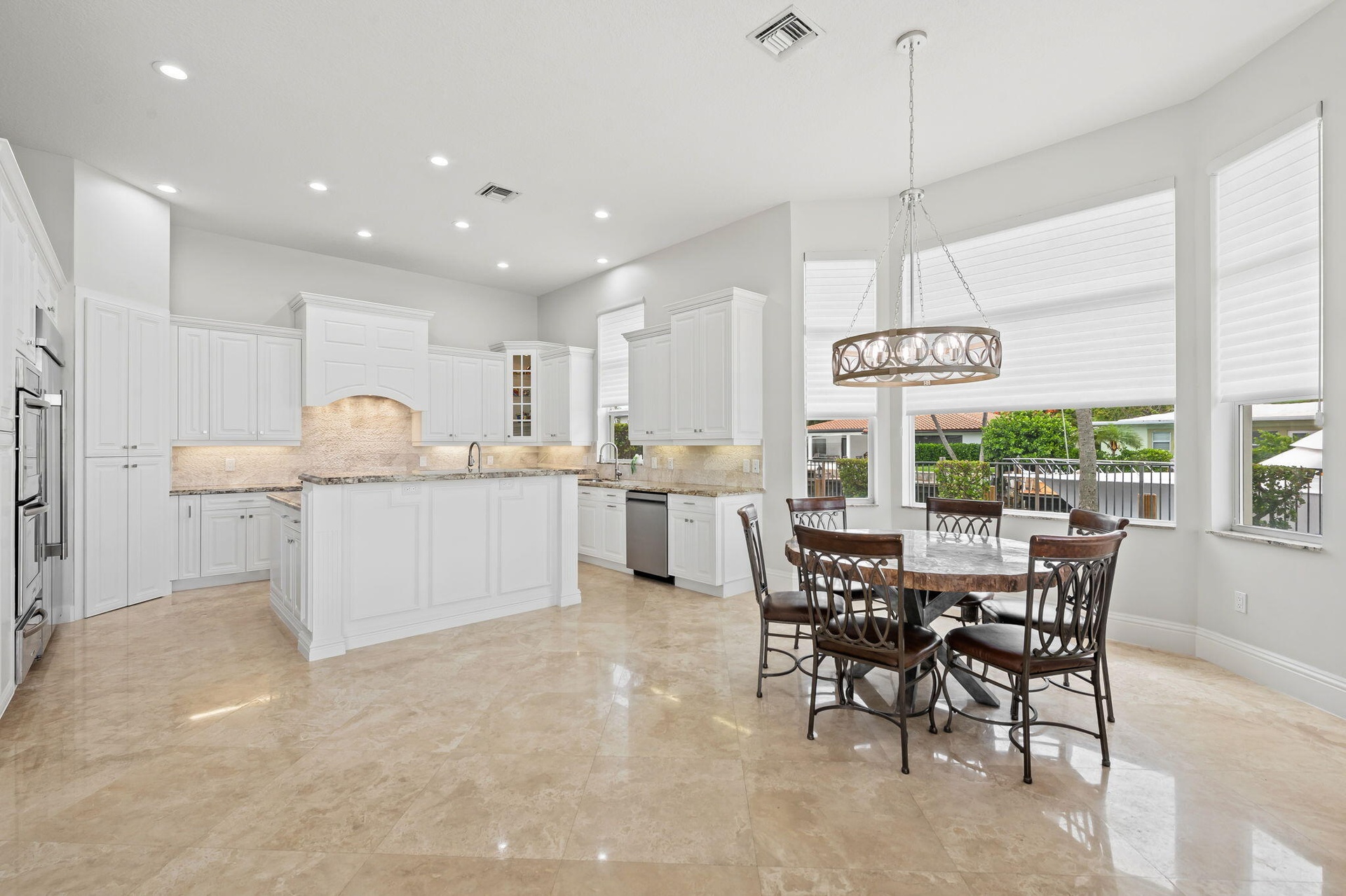 Newly updated kitchen cabinets and backsplash