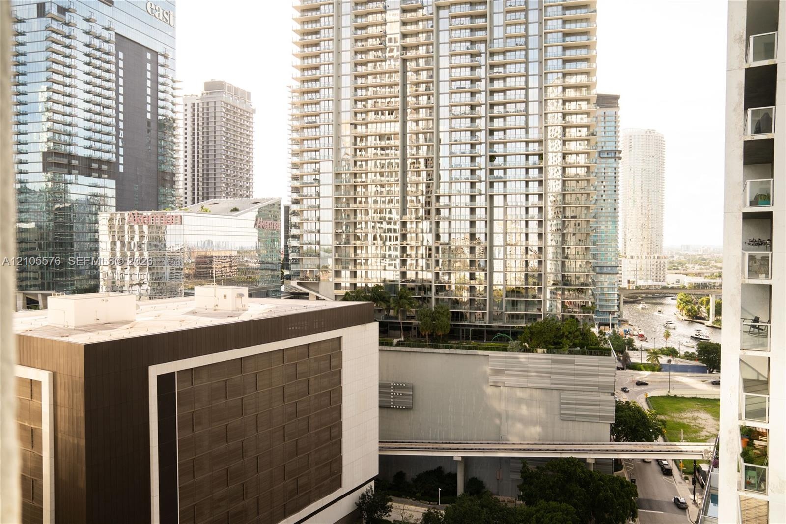 Urban skyline perspective featuring glass-curtain high-rise architecture and metropolitan density