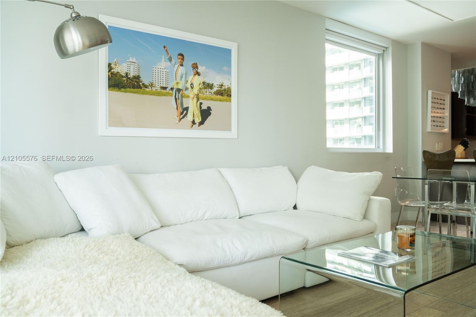 Neutral wall paint, wood-finish flooring, and recessed ceiling lighting