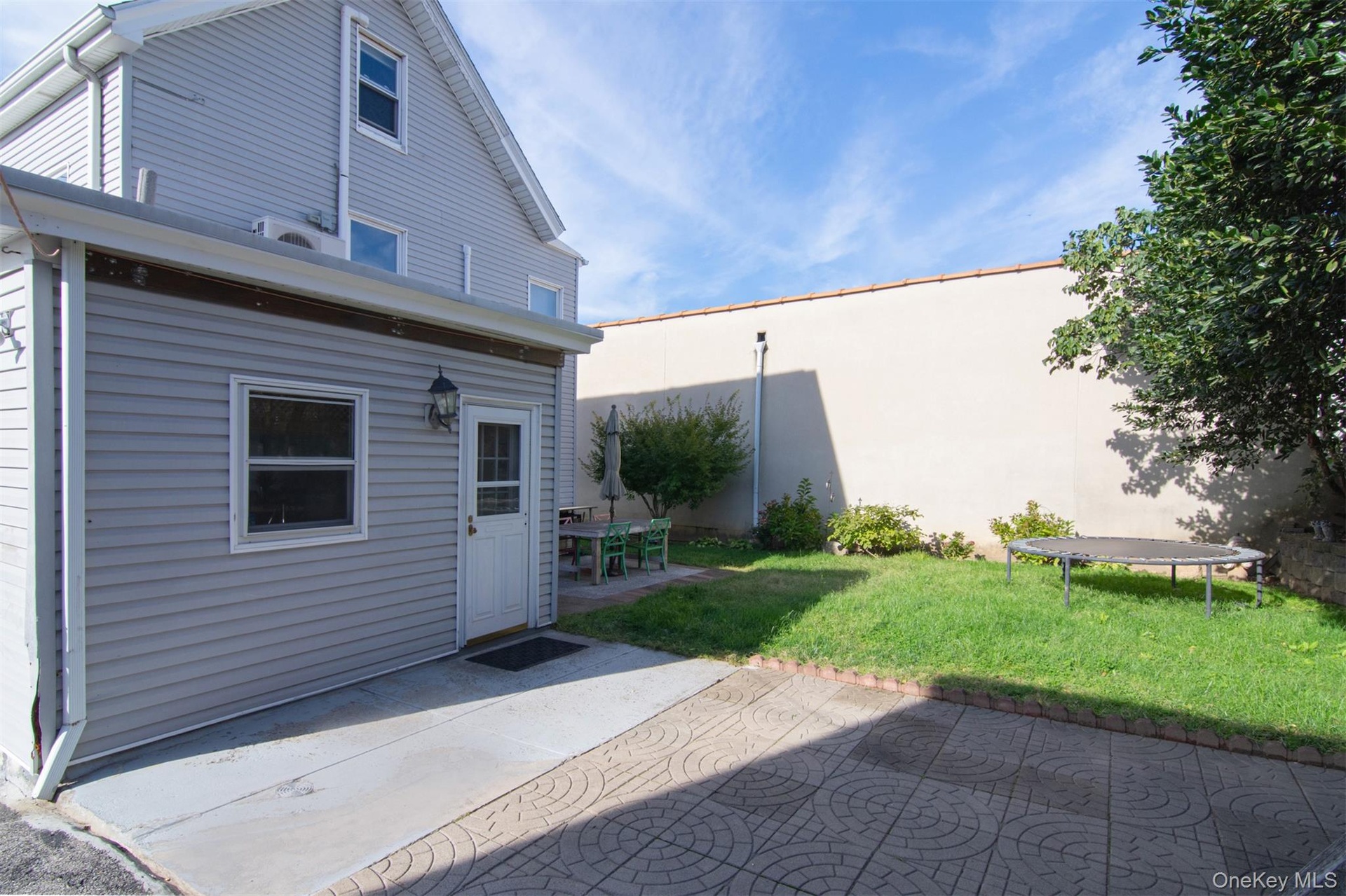 Backyard featuring 2 patios