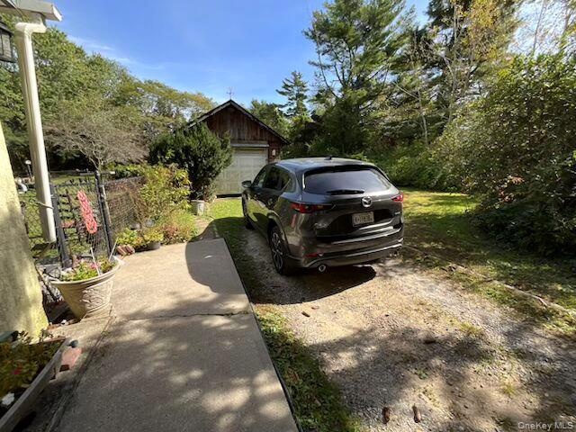 Driveway with detached garage