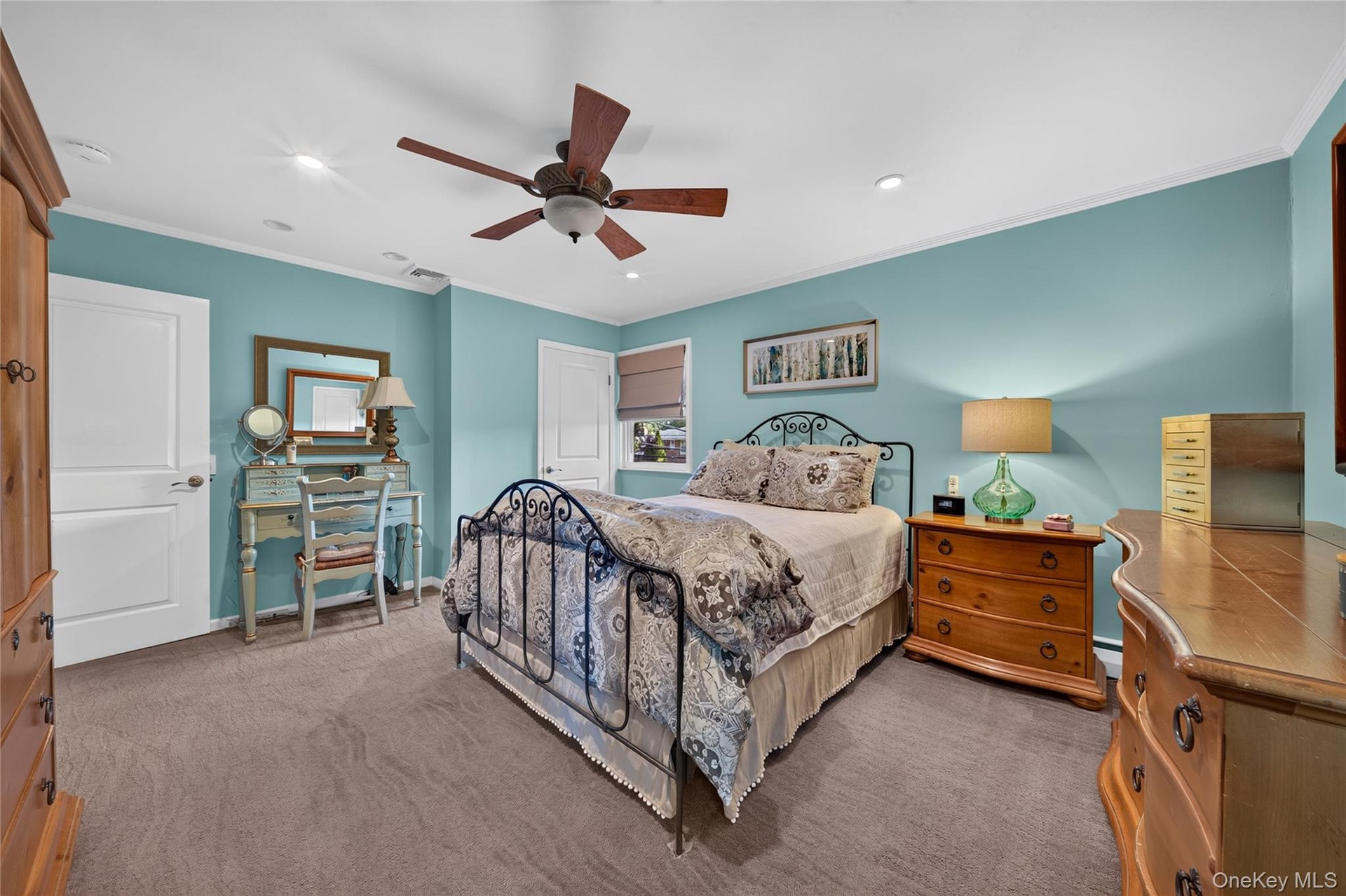 Spacious room featuring carpeting, recessed lighting, and a ceiling fan with integrated lighting