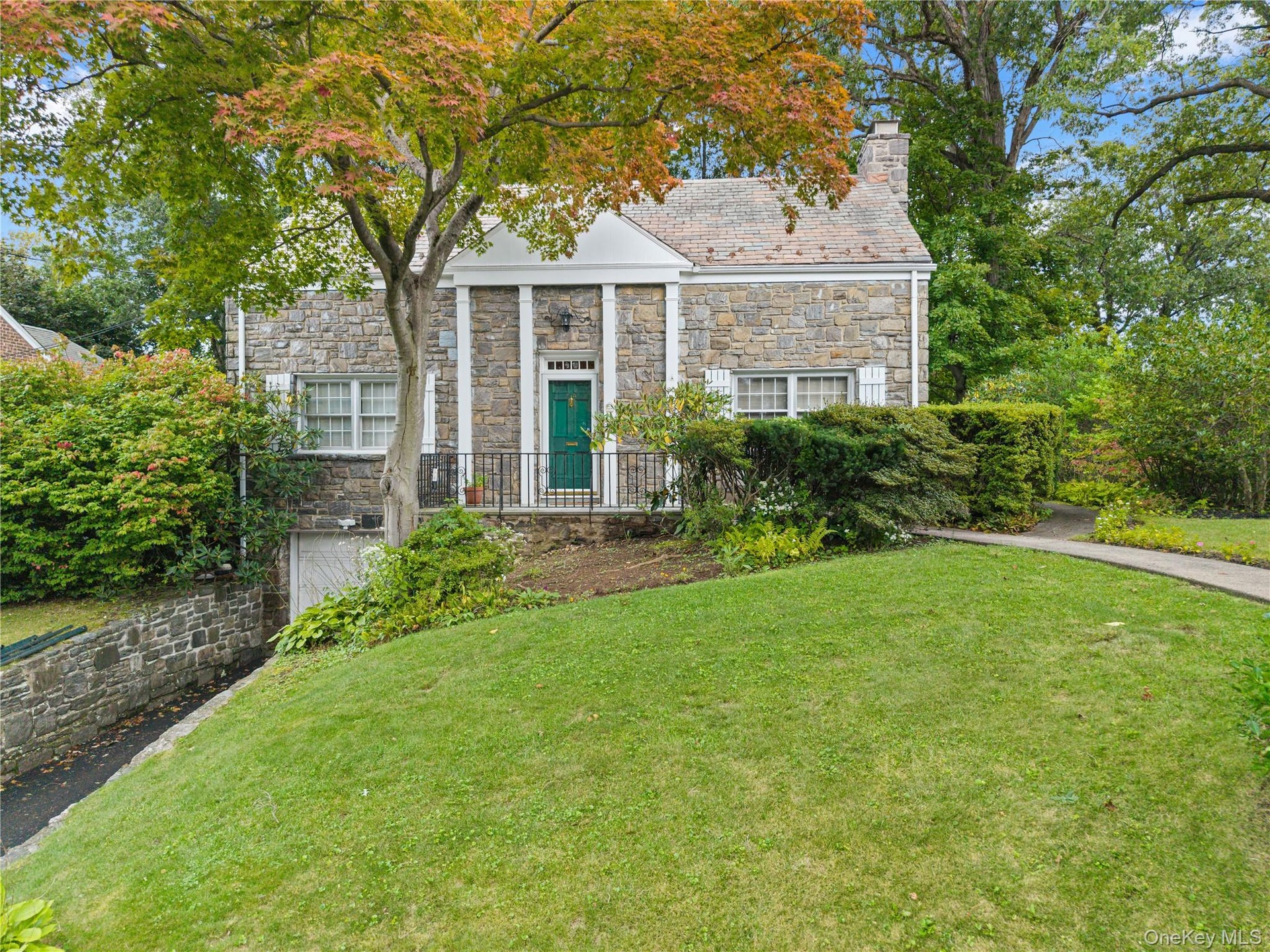 Located on a quiet street in the sought-after Park Hill neighborhood