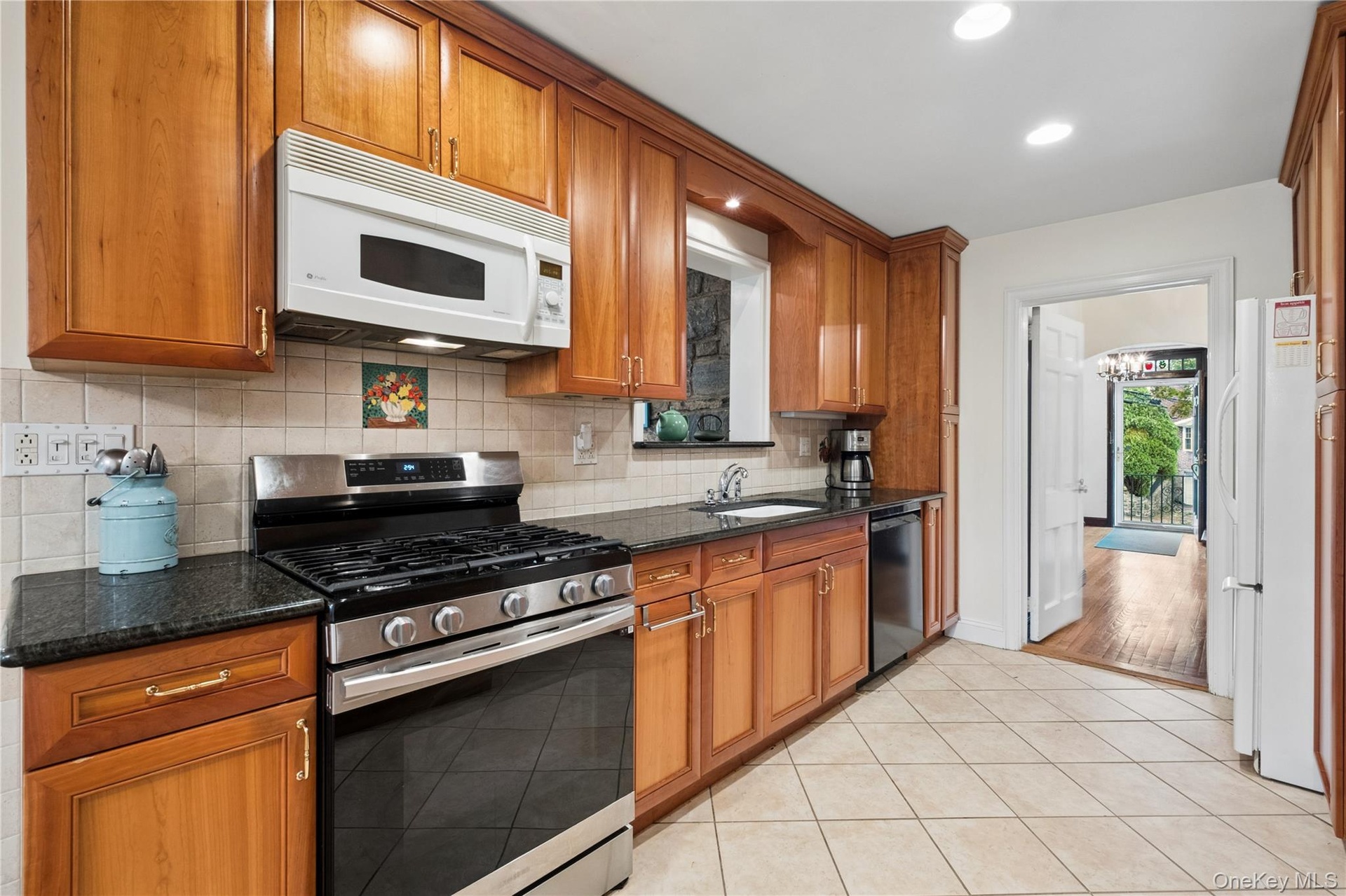 Kitchen with Gas Range, Microwave & Dishwasher