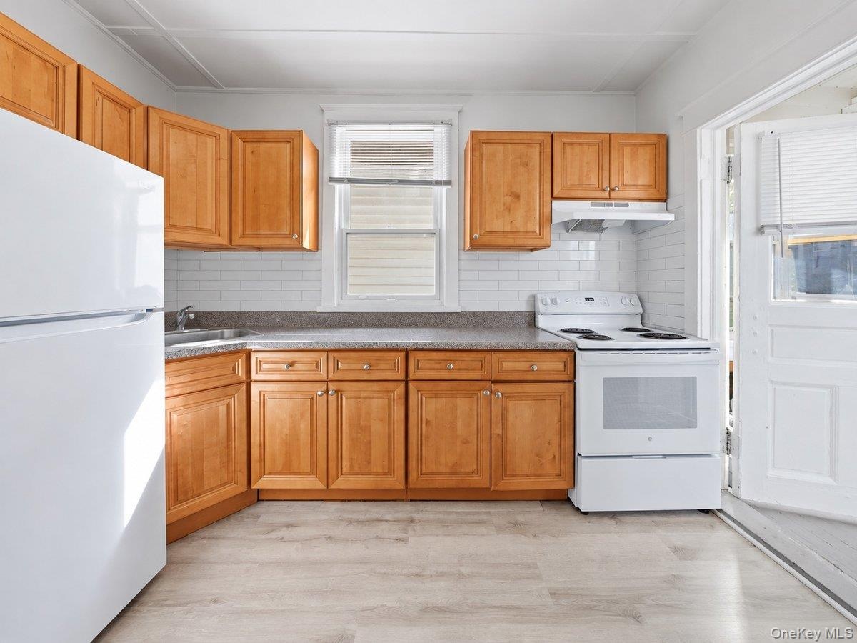 Second floor:(2 Bedroom apartment with a rear enclosed Porch)