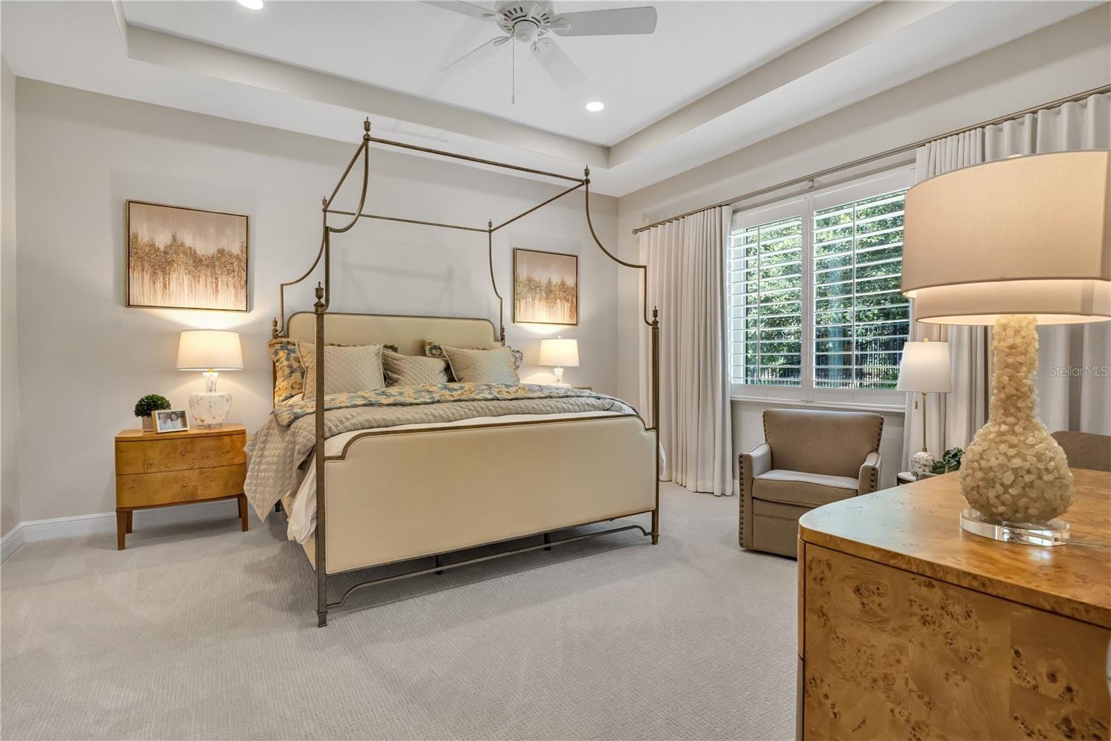 Elegant primary suite offering a peaceful retreat with sophisticated finishes.