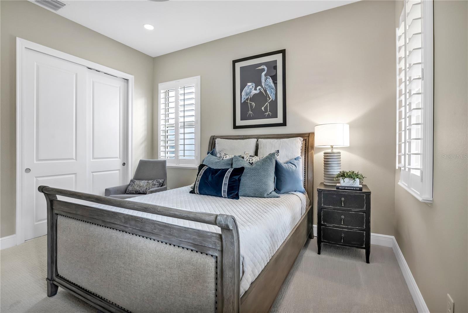 Additional view showcasing the bedroom's generous layout and closet space.