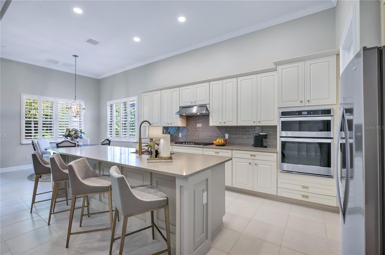 Beautifully appointed kitchen with stylish cabinetry, generous counter space, and an inviting layout.