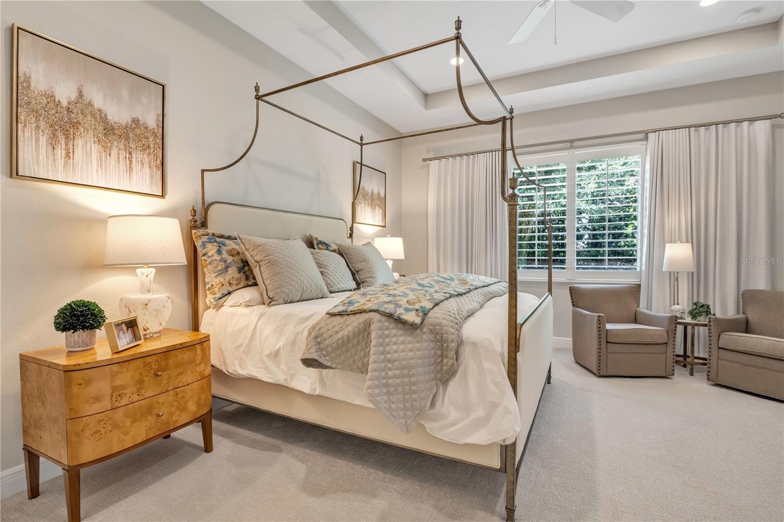 Spacious primary retreat offering comfort, elegance, and relaxation.