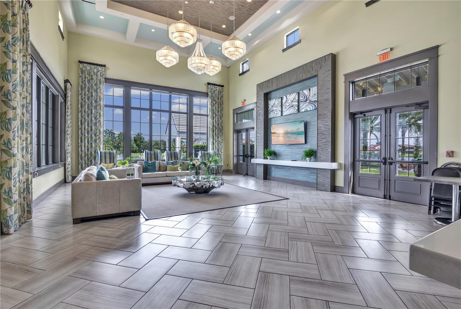 Elegant community clubhouse featuring impressive architectural details and inviting gathering spaces.