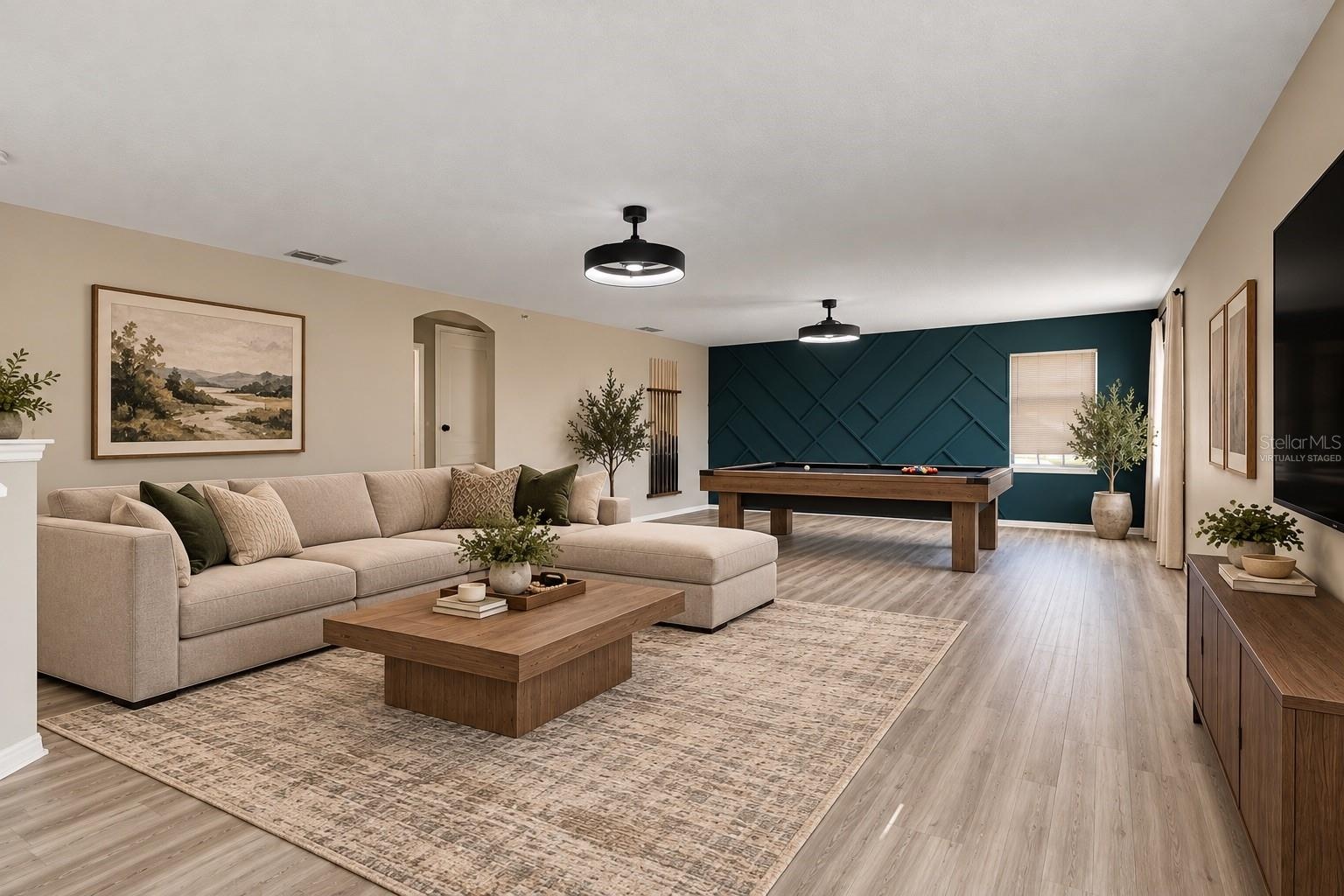 Upstairs, a HUGE LOFT with UPDATED LIGHT/FAN FIXTURES and an accent wall, provides valuable flex space for a media room, game room, home office or add