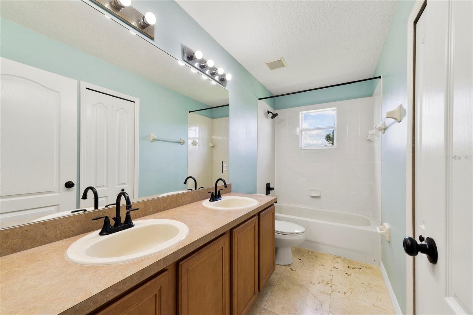 A third full Bath completes the upper level.
