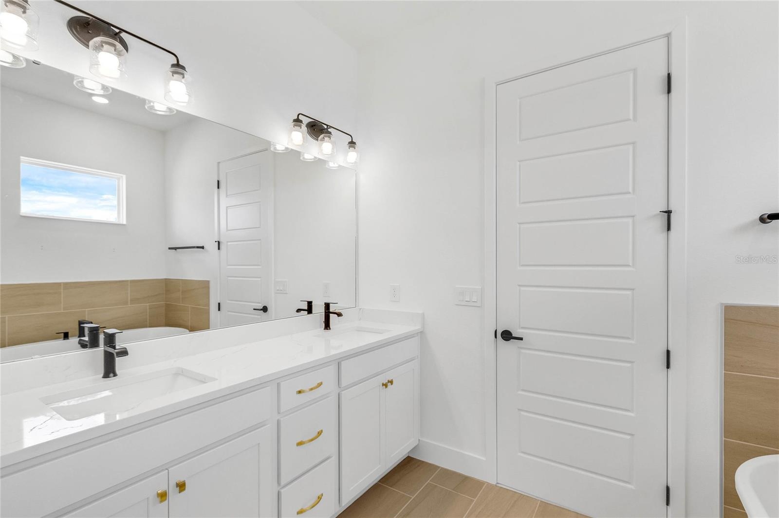 Primary bathroom (representative photo)