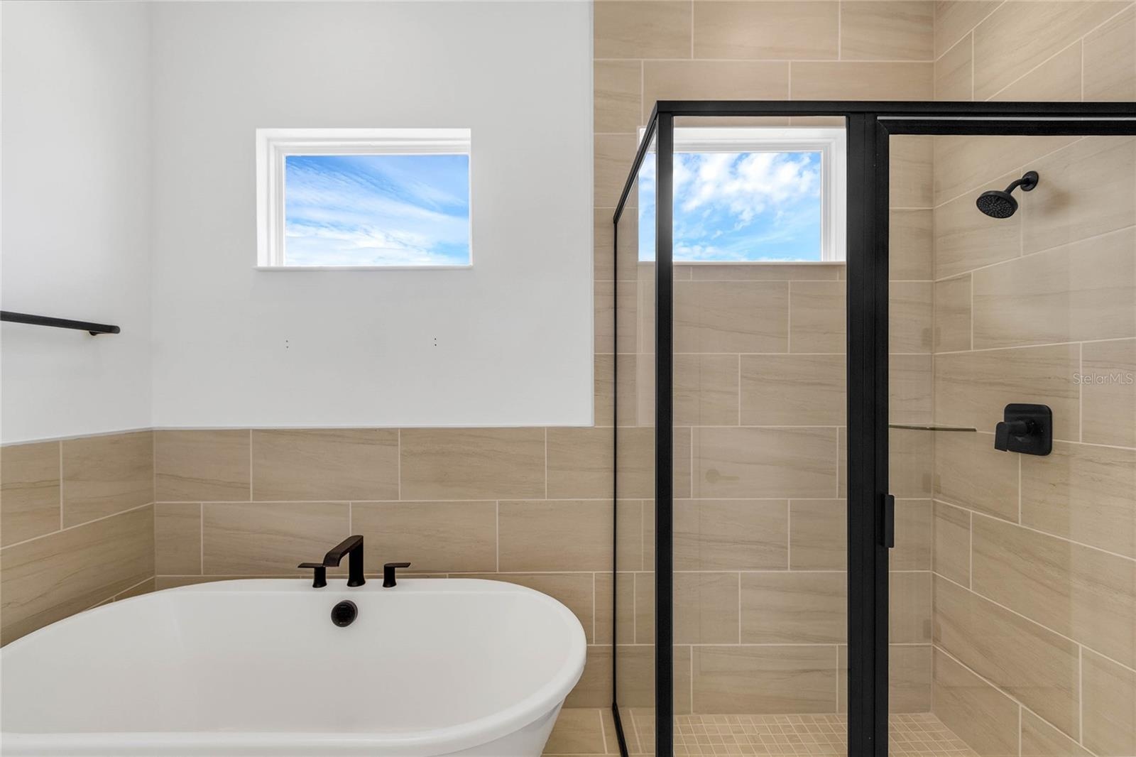 Primary bathroom (representative photo)
