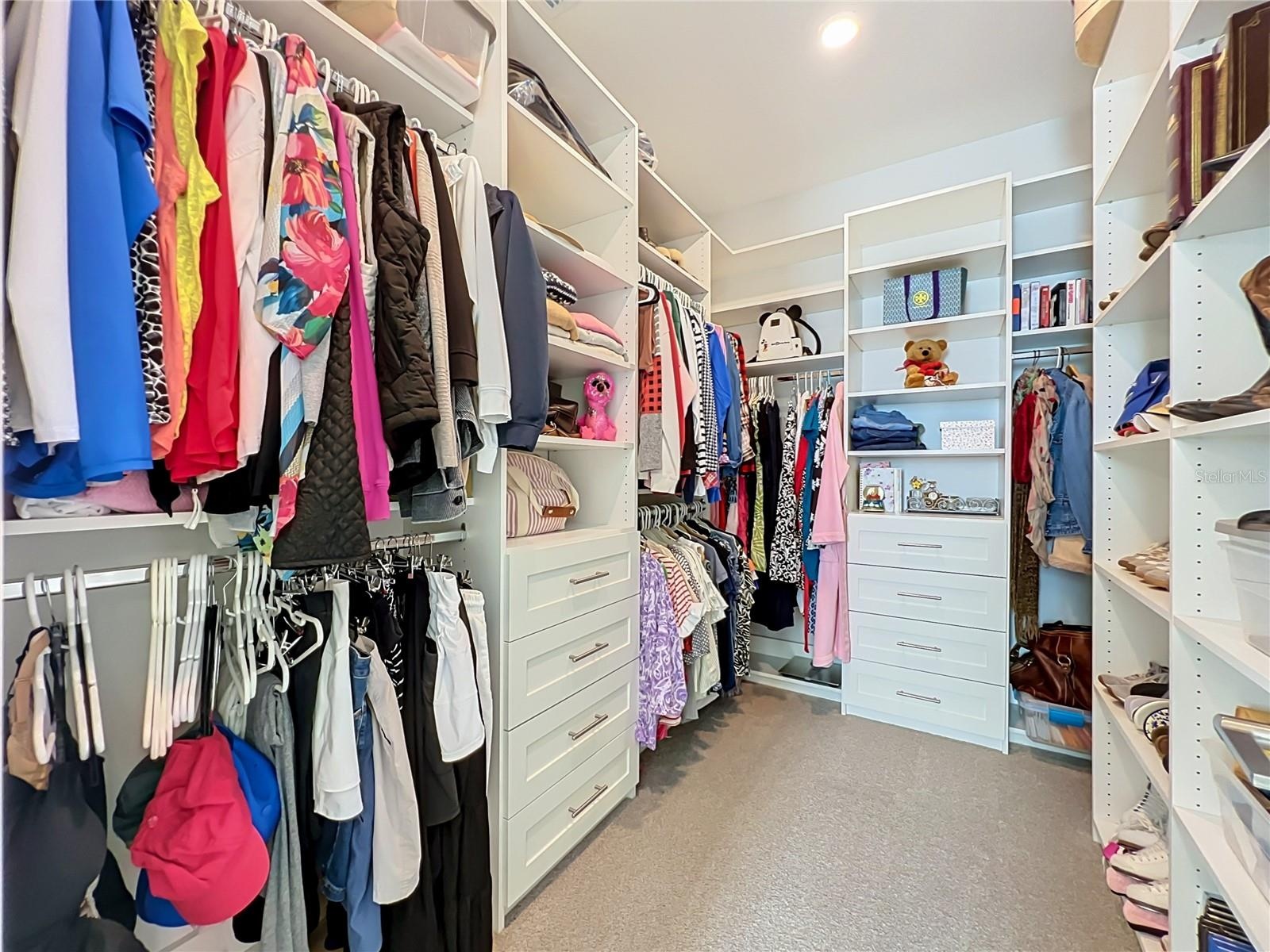 One of master bedroom walk in closets