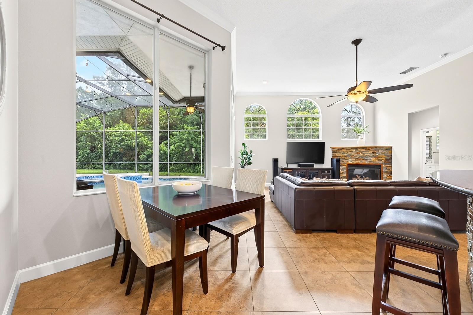 Breakfast nook off the kitchen, open to the family room.
